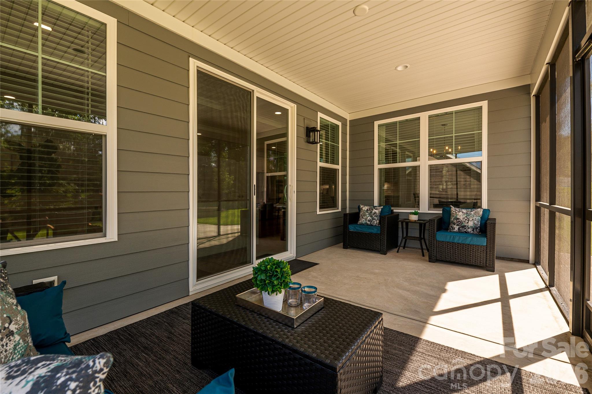 Upgrade: spacious screened-in porch has room for dining and relaxing. . - 2566 NW Red Hill Street, Concord