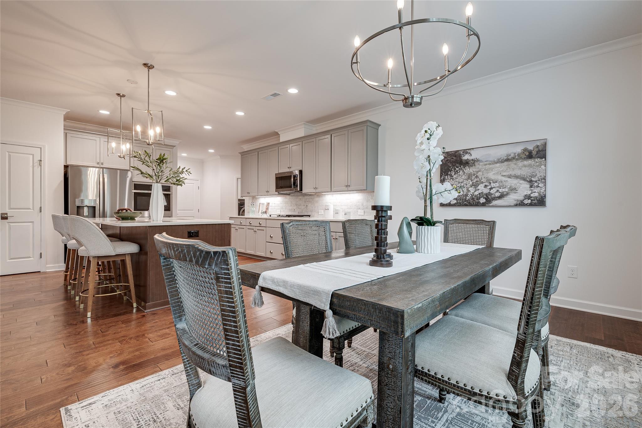 Spacious kitchen and dining area with upgraded recessed lighting. - 2566 NW Red Hill Street, Concord
