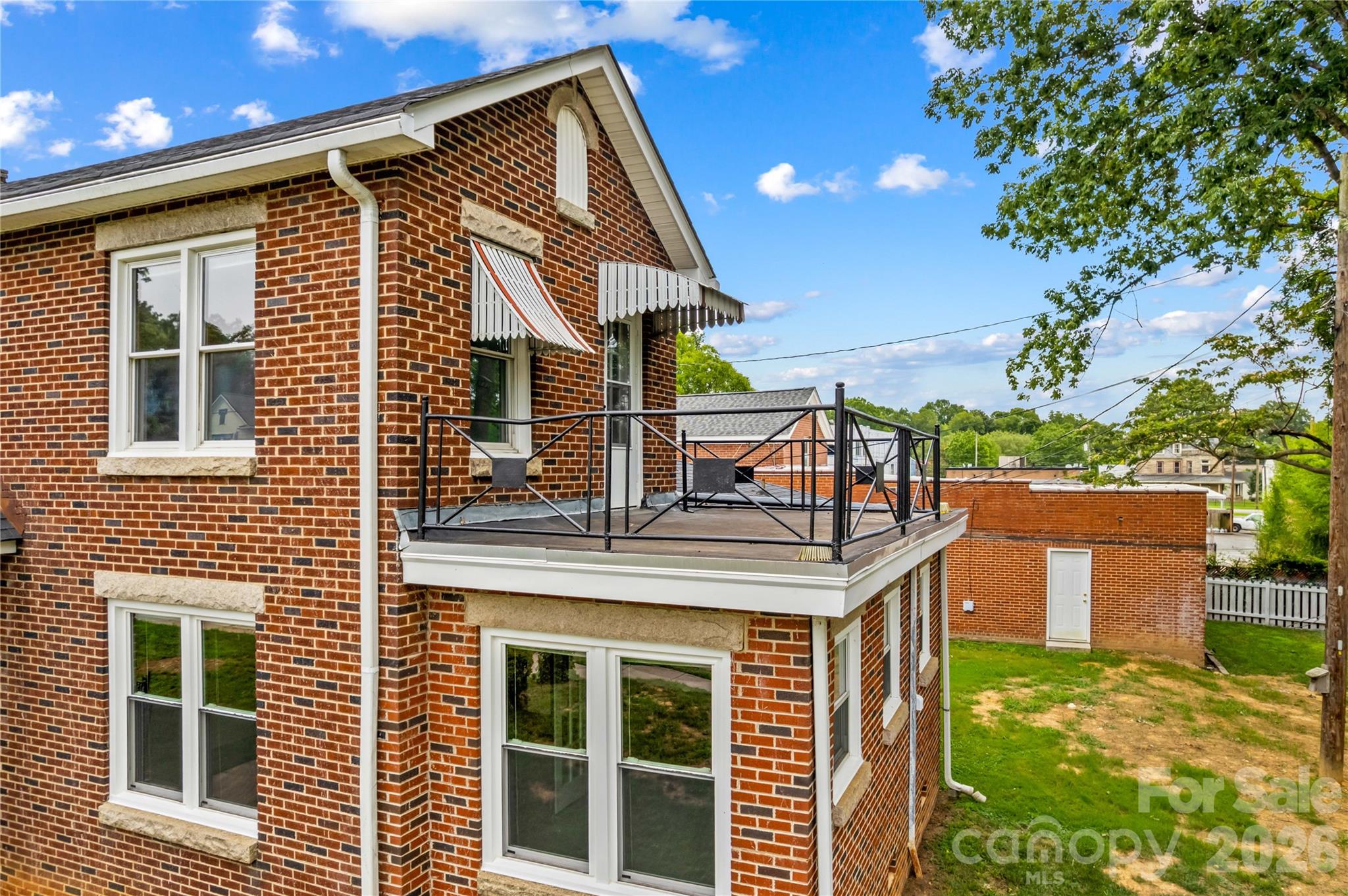 Private balcony accessible from upstairs bedroom. - 615 S Church Street, Salisbury