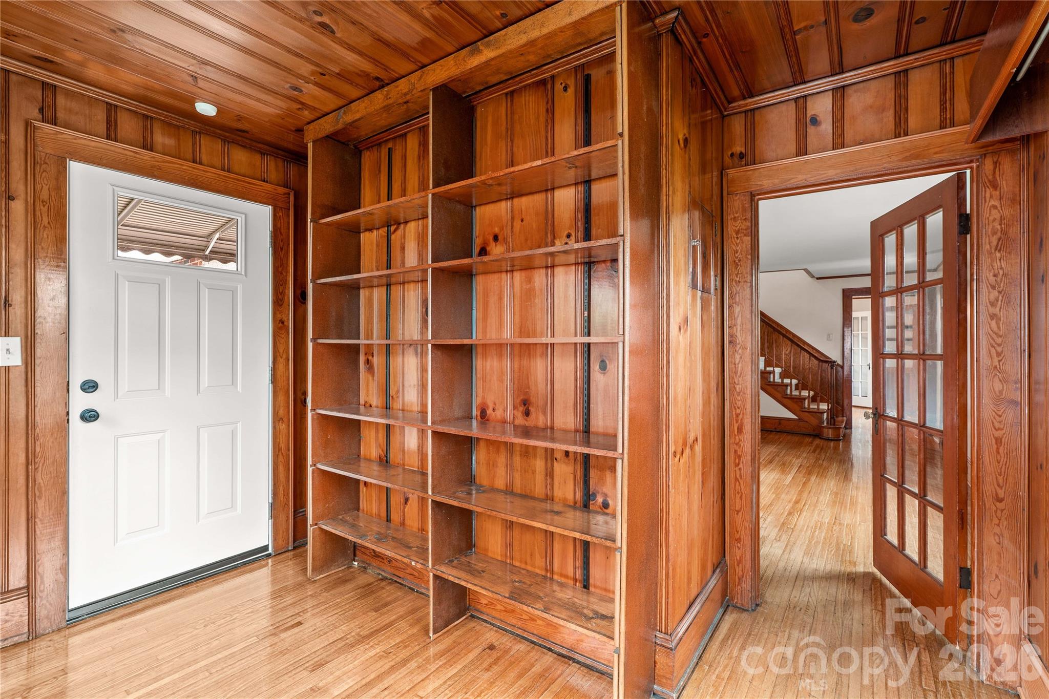 Study/office with shelving is on the main level on the left of the house. - 615 S Church Street, Salisbury