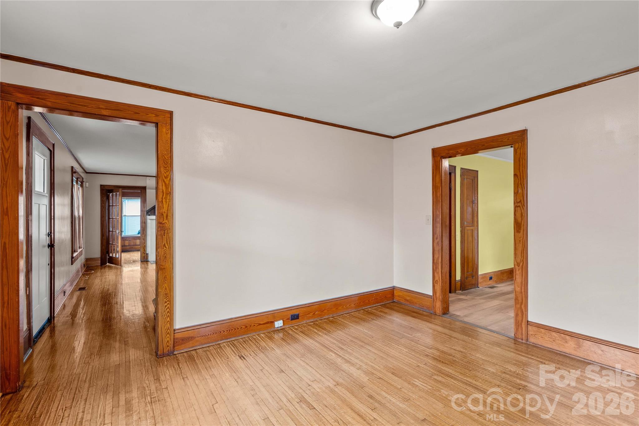 Dining room looking toward front door and living room on the left. - 615 S Church Street, Salisbury