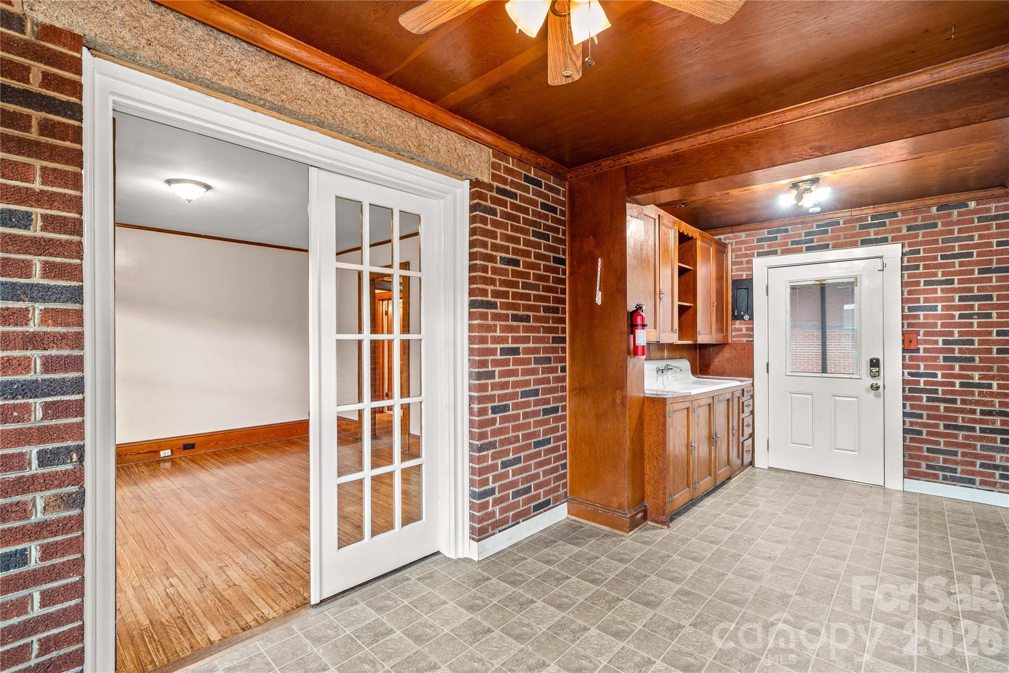 Sunroom/utility room is right off the dining room. - 615 S Church Street, Salisbury