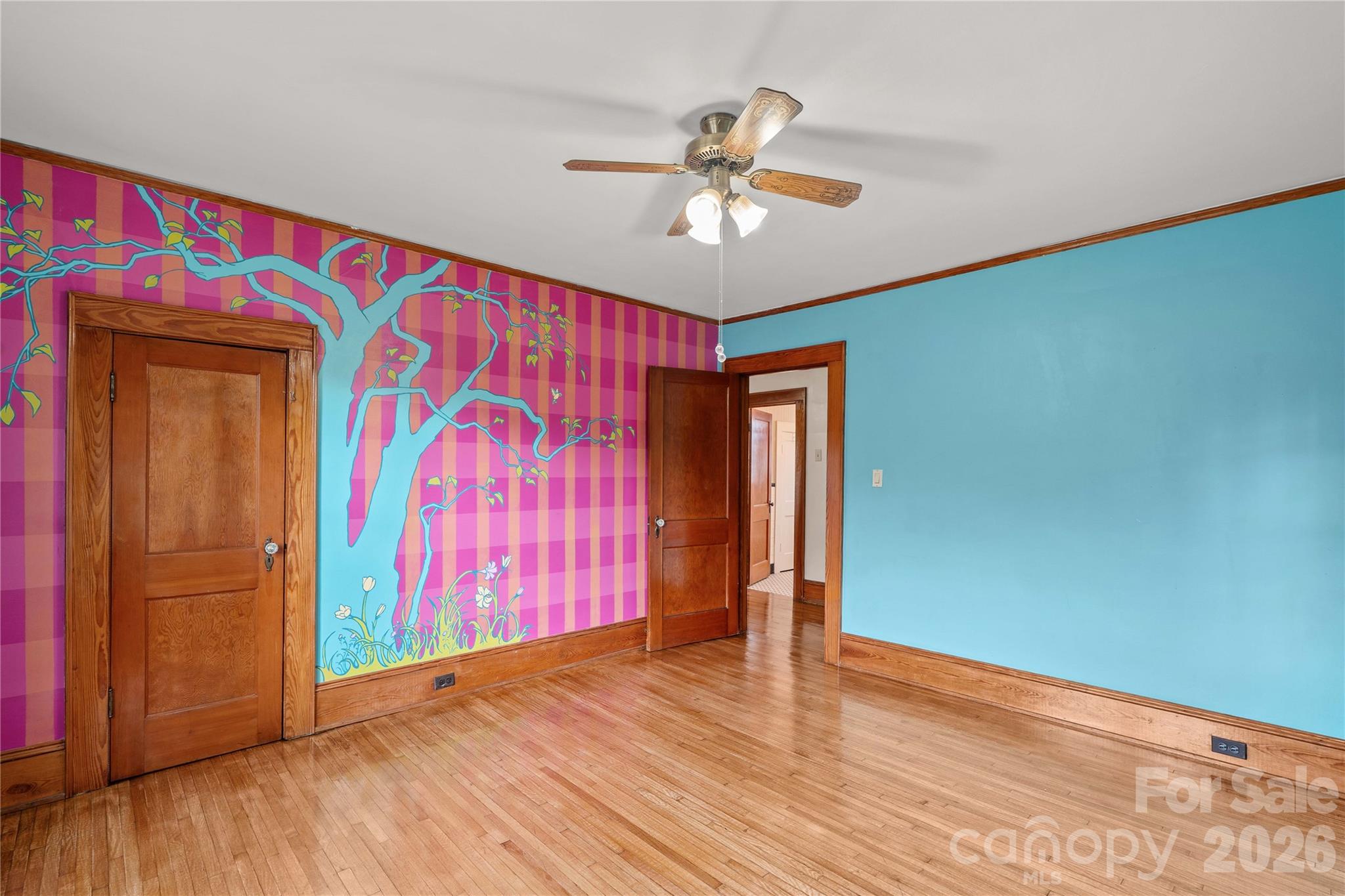 Bedroom #2 has mural accent wall. - 615 S Church Street, Salisbury