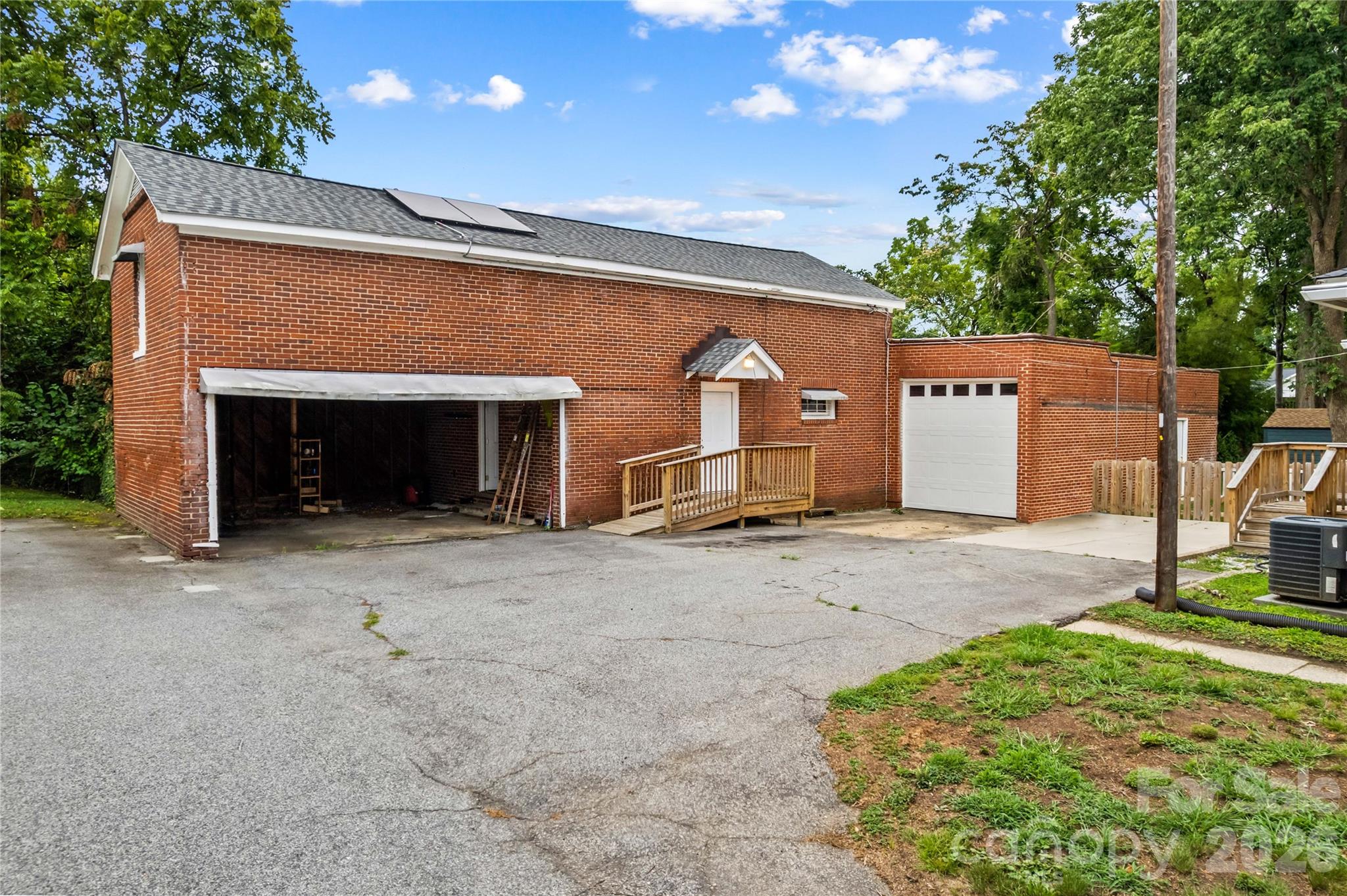 Additional building in back was once Fleming Candy Company warehouse. Garage spaces, electricity, and more advantages. - 615 S Church Street, Salisbury