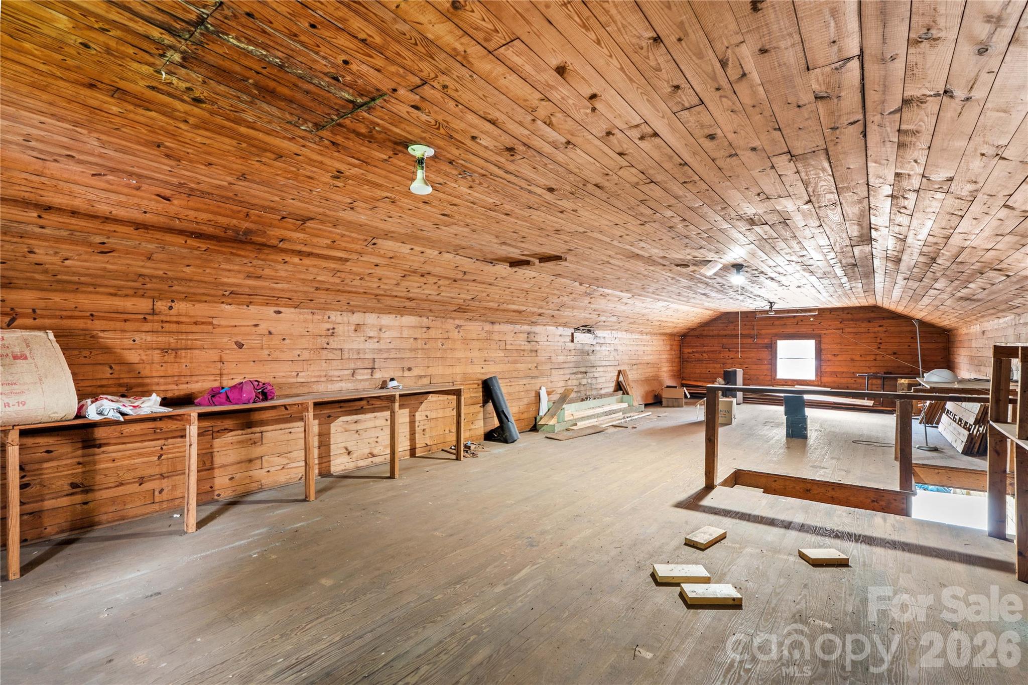 Upstairs of the additional building has storage galore or space to build a studio, additional living space, workshop, additional storage or create your own vision of a place to gather. - 615 S Church Street, Salisbury