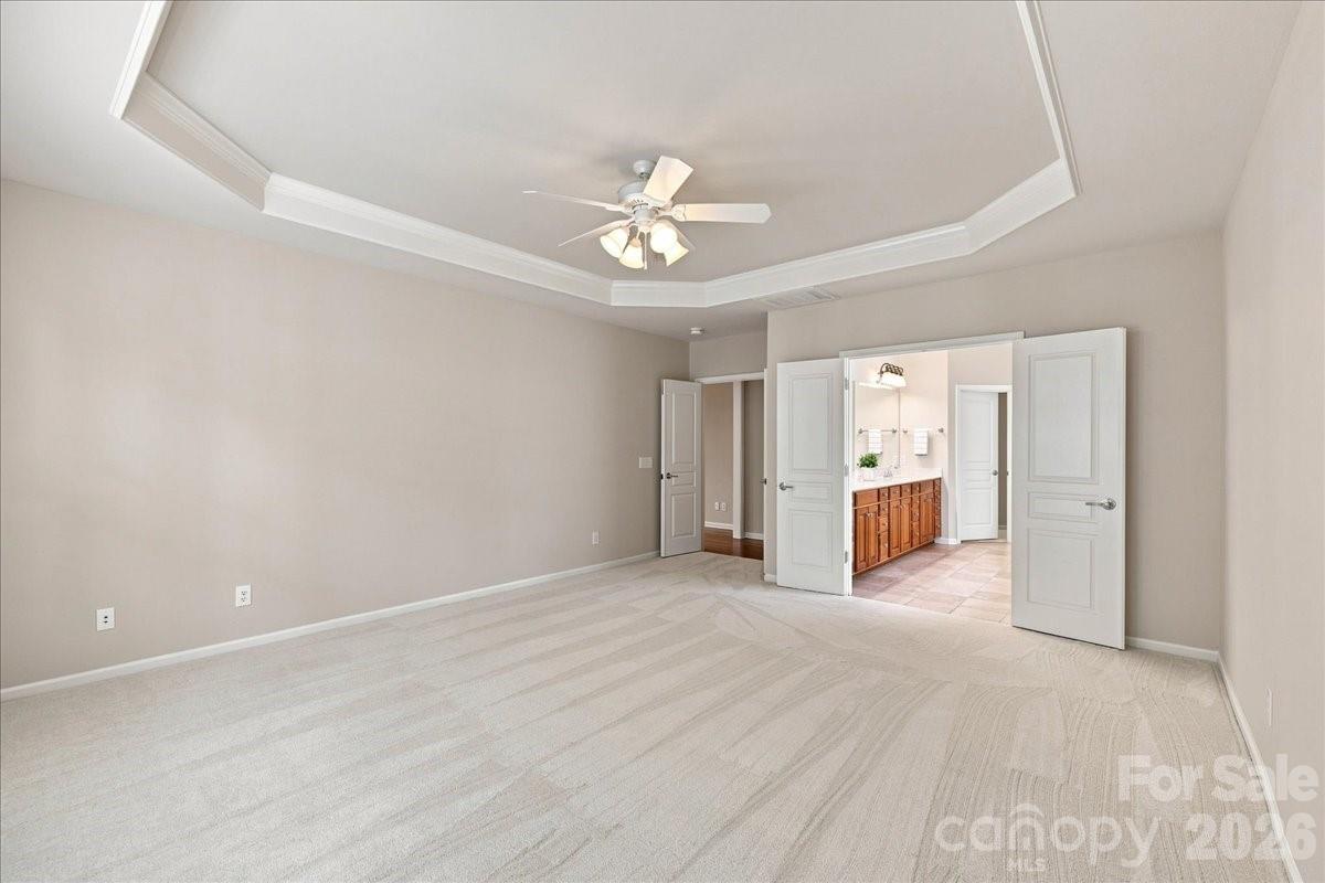 Double Doors into the Primary En-Suite Bath - 39650 Rosebay Court, Indian Land