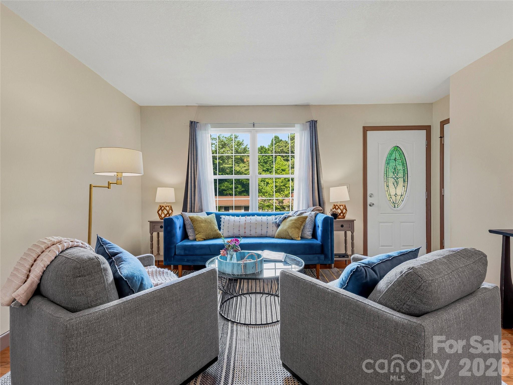 Single Family Residence at 1019 Mountain Drive, Candler, photo 2 of 28