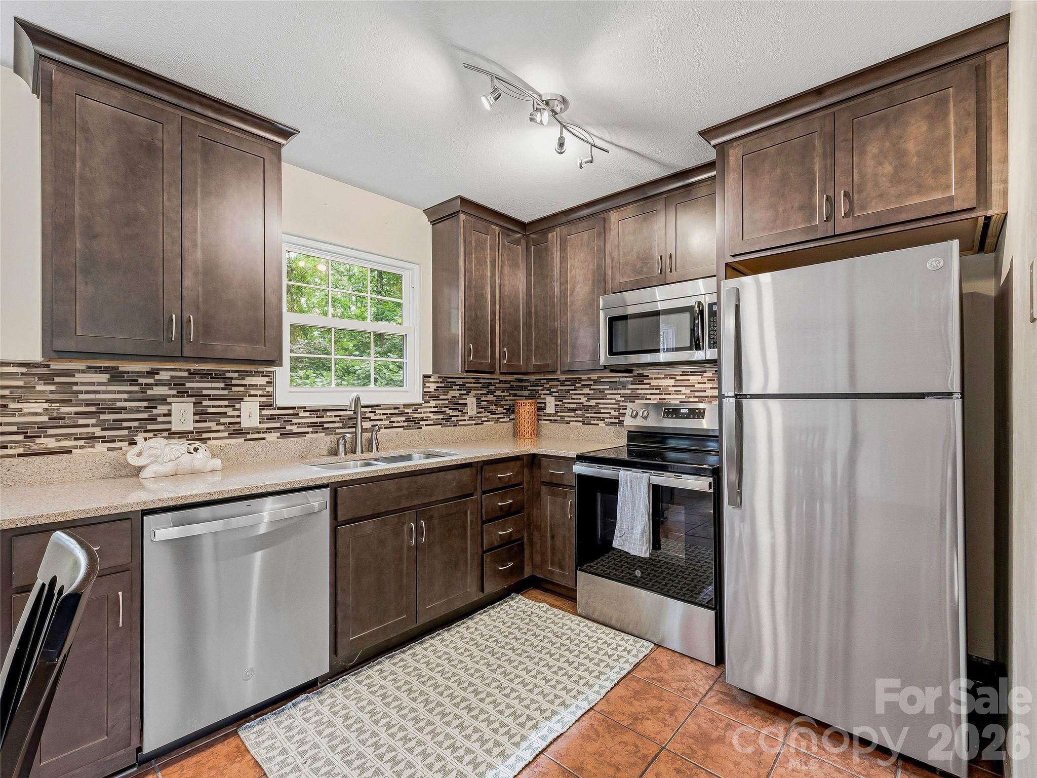 Single Family Residence at 1019 Mountain Drive, Candler, photo 6 of 28