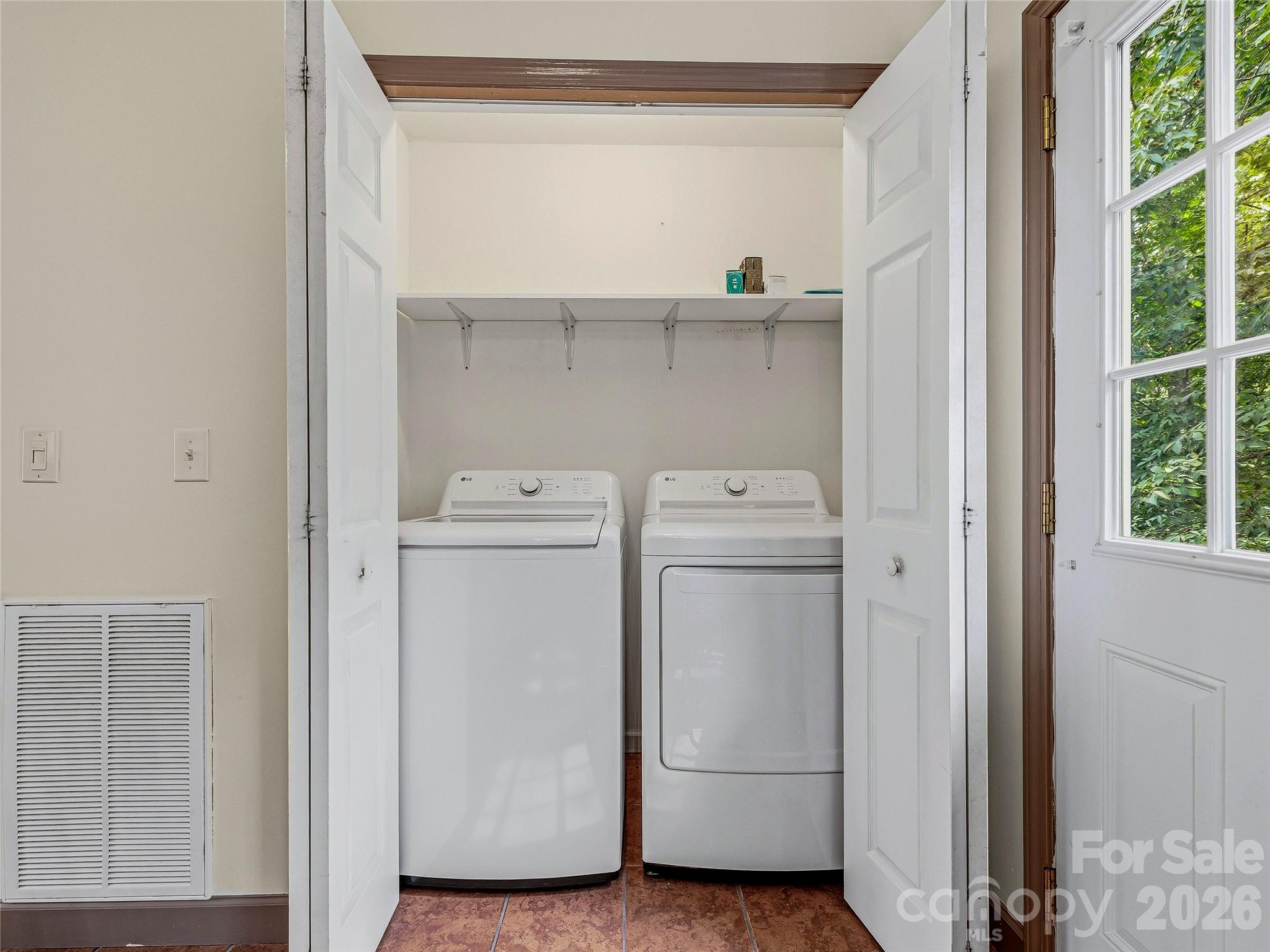 Single Family Residence at 1019 Mountain Drive, Candler, photo 9 of 28