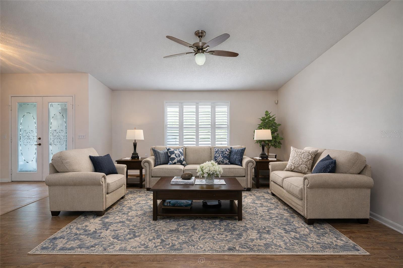 Living Room - virtually staged - 130 BAYSIDE DR, PALM COAST