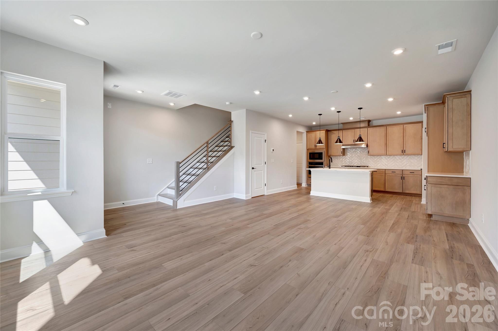Open-Concept Living with Open Rail and Oak Box Stairs - 463 Nash Street, Fort Mill
