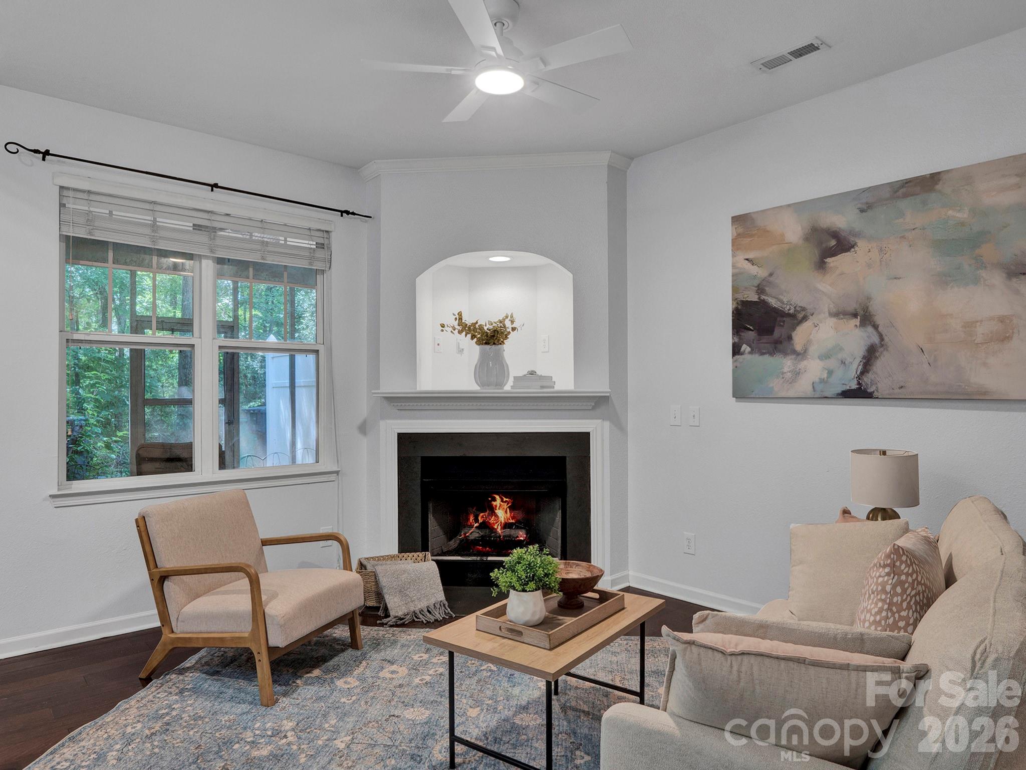 Living room with backyard views - 10747 Essex Hall Drive, Charlotte