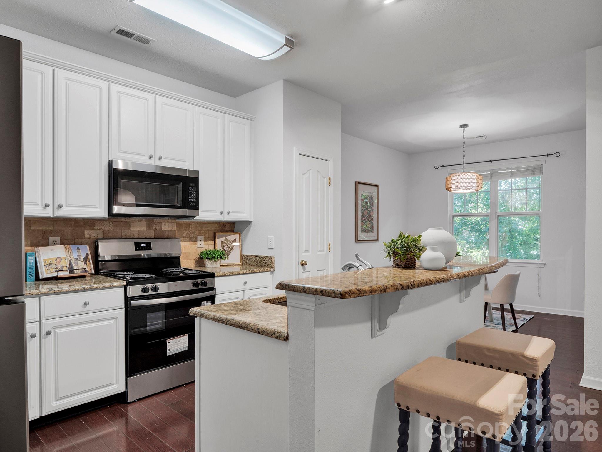 Plenty of cabinets in kitchen - 10747 Essex Hall Drive, Charlotte