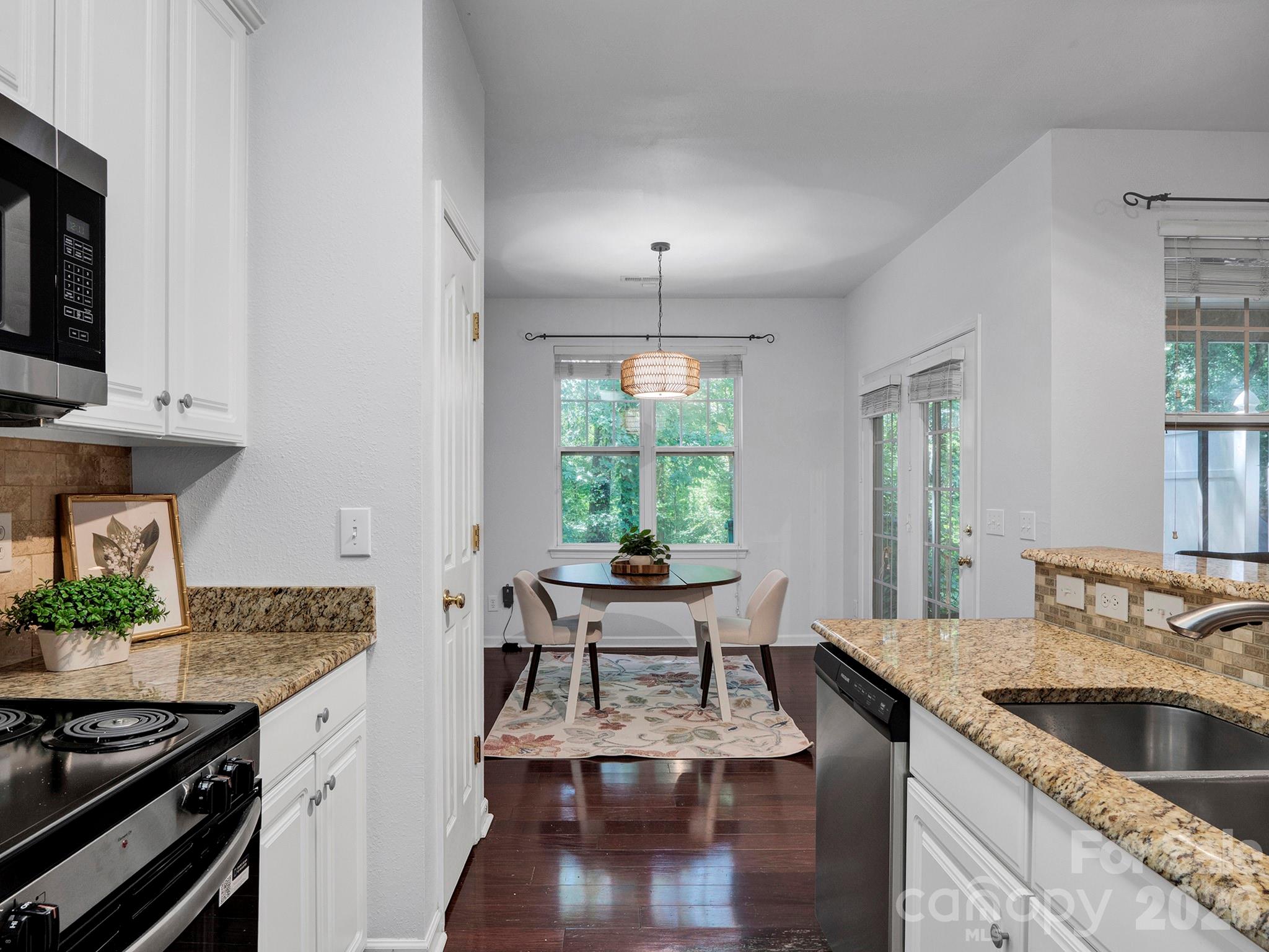 New paint ads to the bright and airy feel of townhome - 10747 Essex Hall Drive, Charlotte