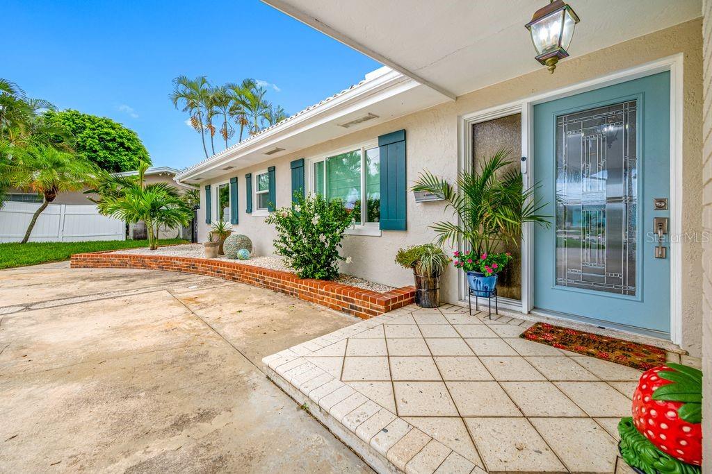 Front entryway - glass pane door and seashell paver front porch - 530 79TH ST S, ST PETERSBURG