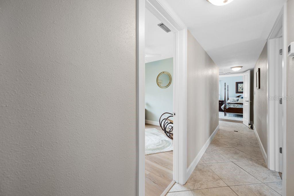 Hallway - Two guest bedrooms off hallway - Primary Suite at the end of the Hallway - 530 79TH ST S, ST PETERSBURG