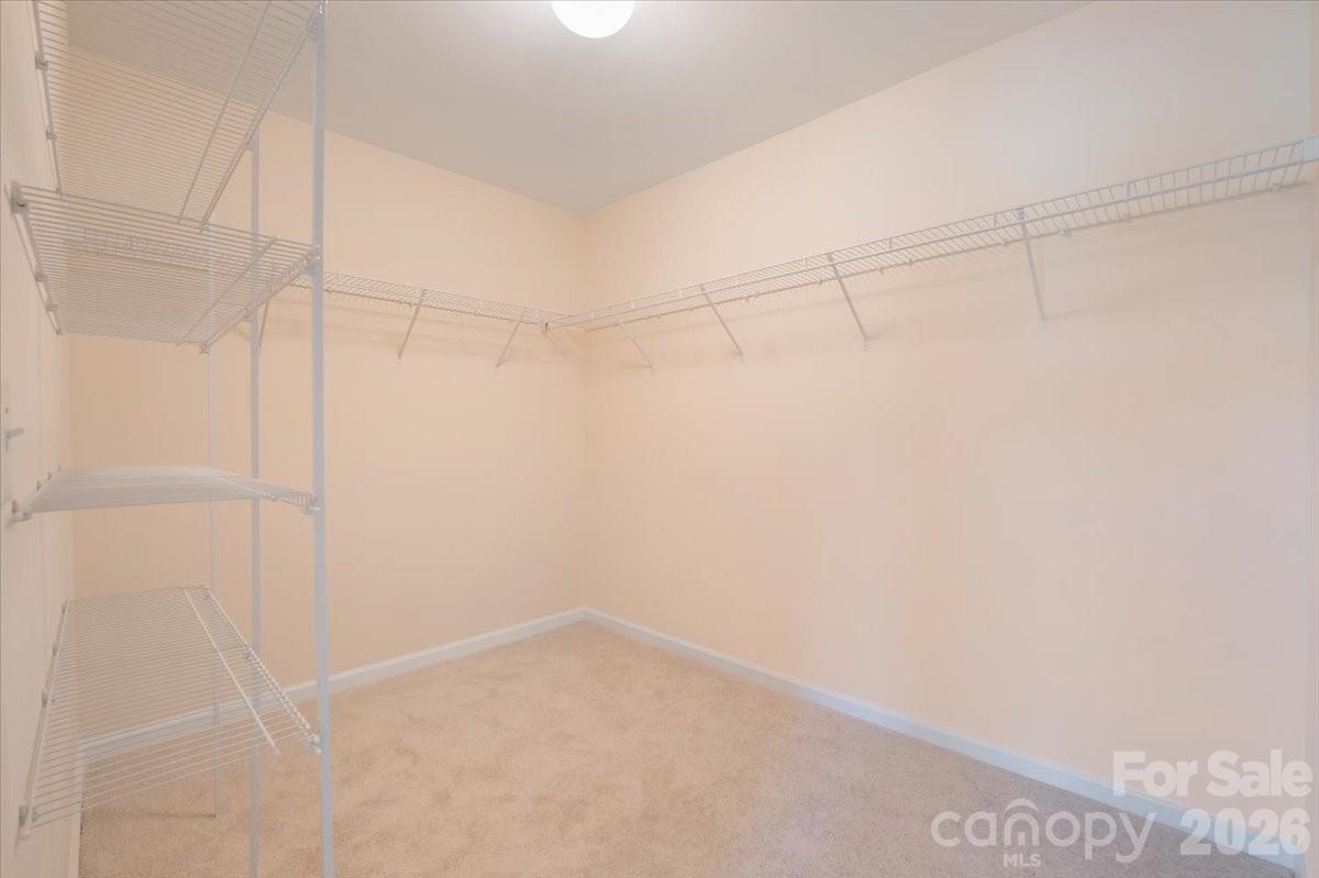 Primary suite Walk in closet - 15505 Davidson East Drive, Davidson