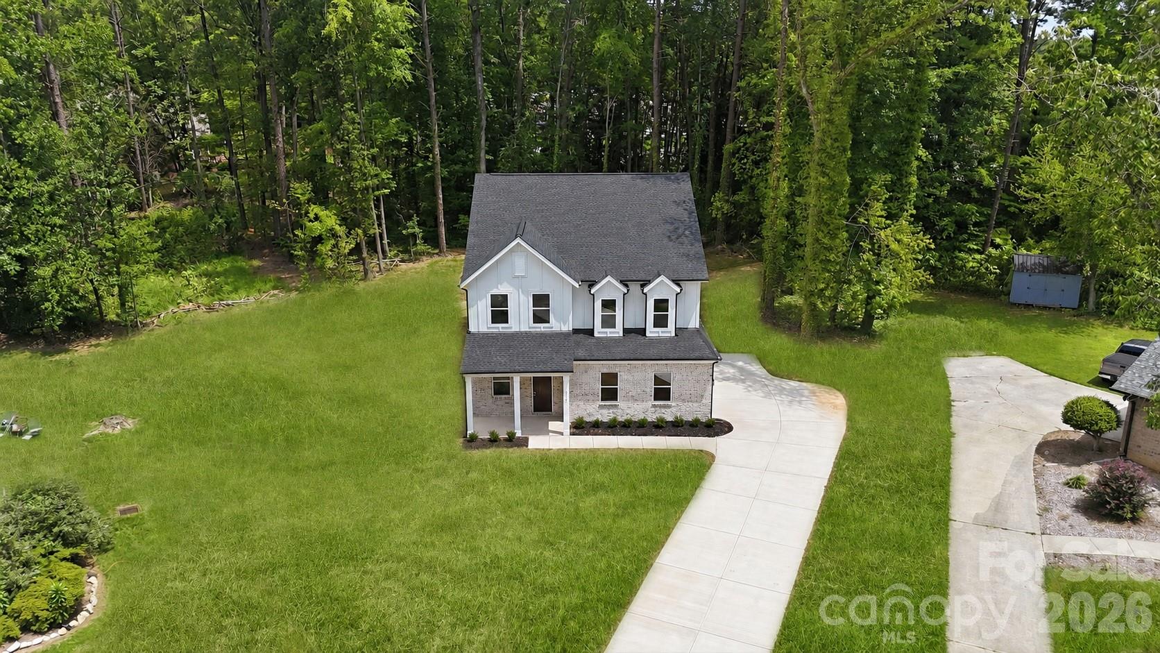 Tucked away on a peaceful, 1-acre cul-de-sac lot in Country Club Hills, this gorgeous new construction home checks all the boxes - 612 Camelot Drive, Salisbury