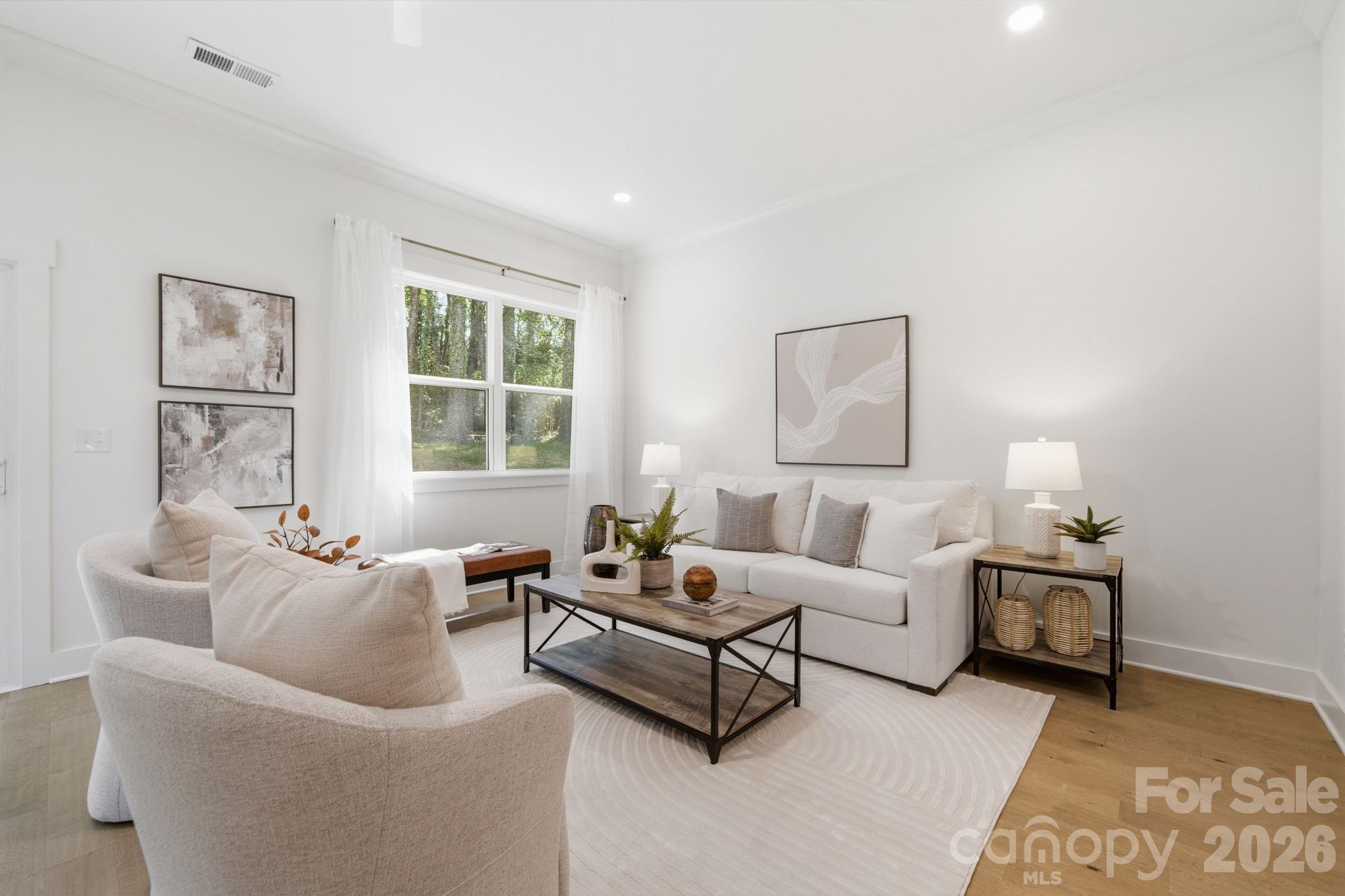 Site-finished hardwood floors, 10' ceilings downstairs, and open concept living - 612 Camelot Drive, Salisbury