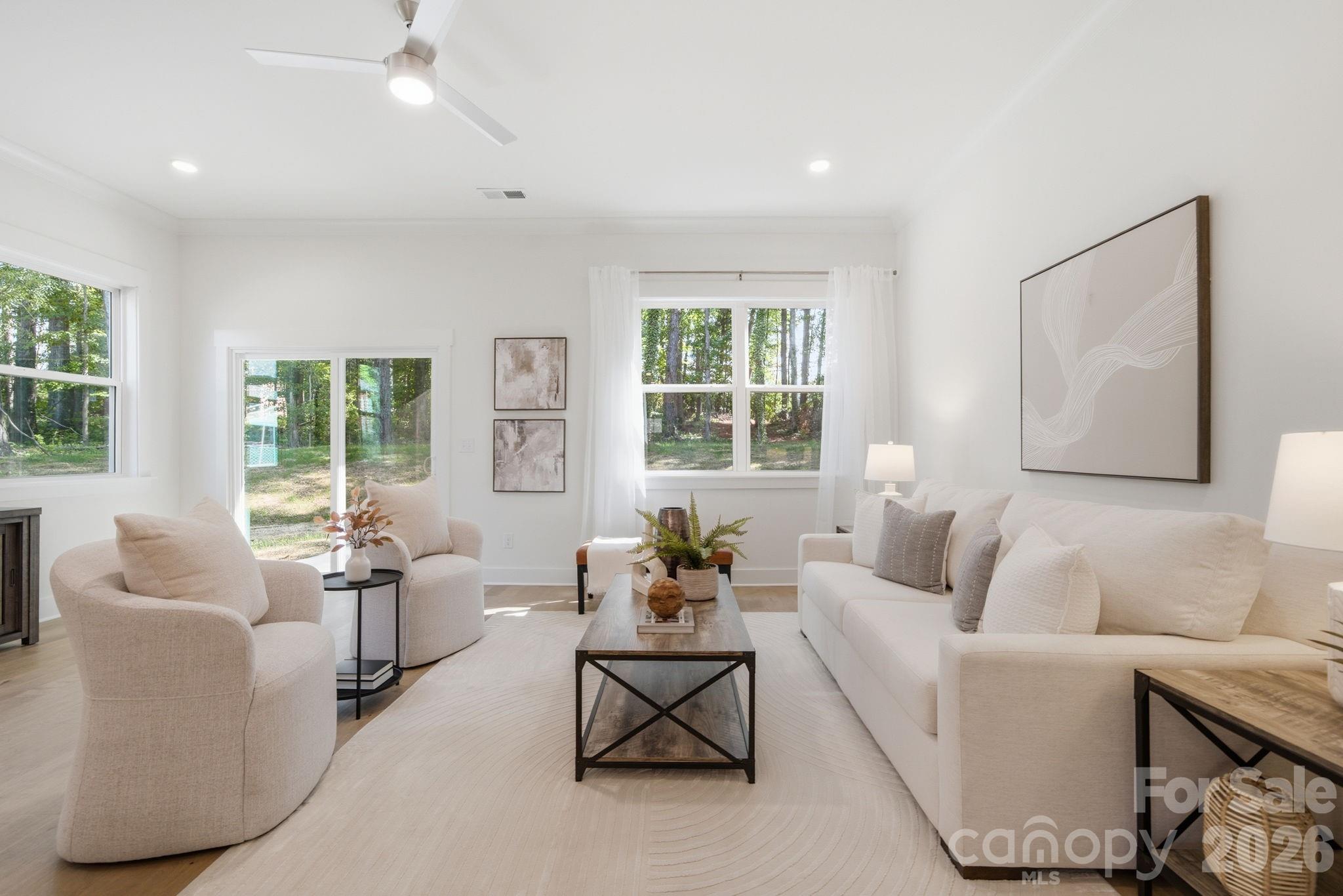 Site-finished hardwood floors, 10' ceilings downstairs, and open concept living - 612 Camelot Drive, Salisbury