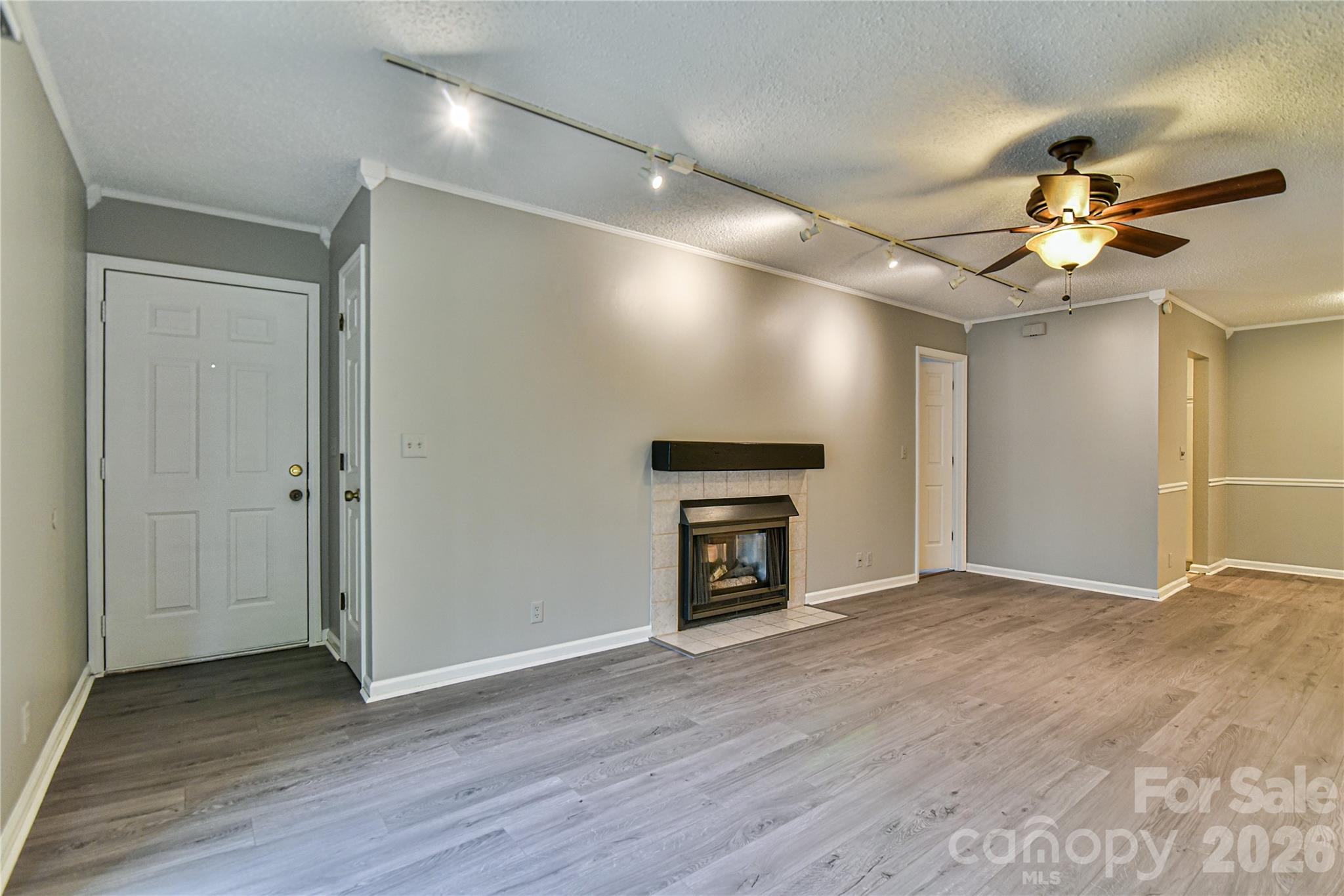 living area has new flooring - 110 Heywood Road, Arden