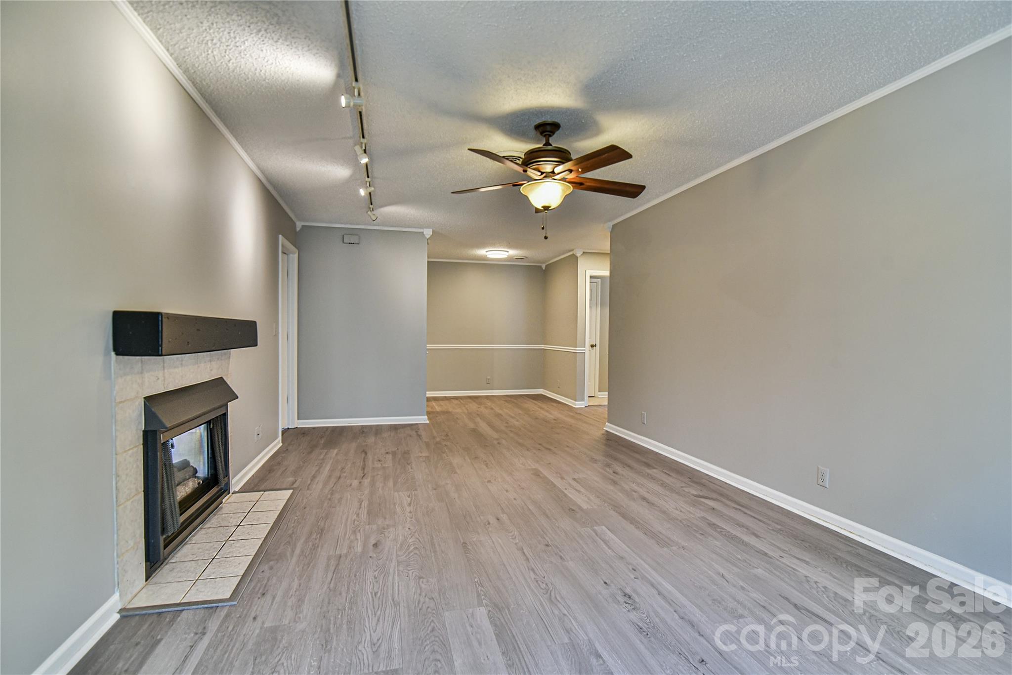 new flooring; gas fireplace - 110 Heywood Road, Arden