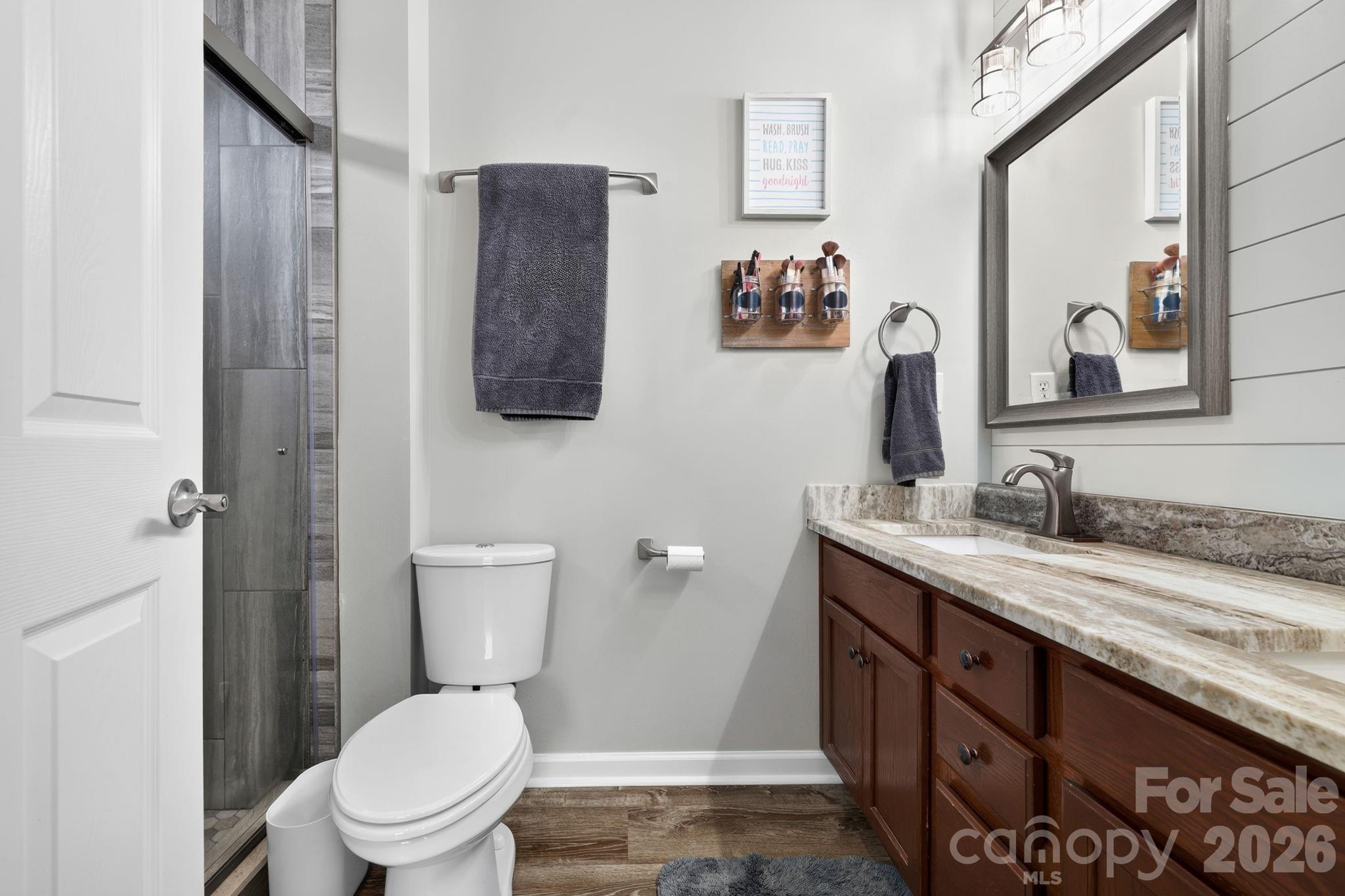 Primary bath with vaulted ceiling and tile shower - 38 E Swift Creek Road, Fletcher