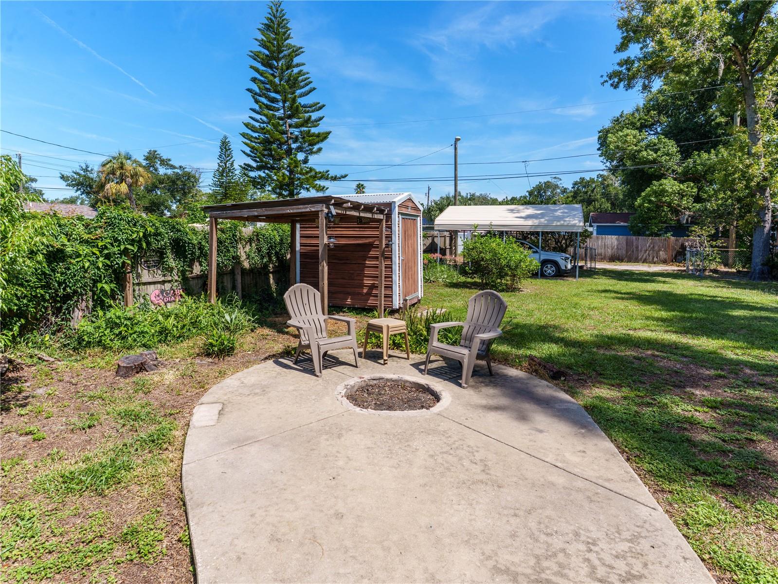 Firepit Area / Oversized Open Carport for Your Boat or or RV - 6155 ILLINOIS AVE, NEW PORT RICHEY