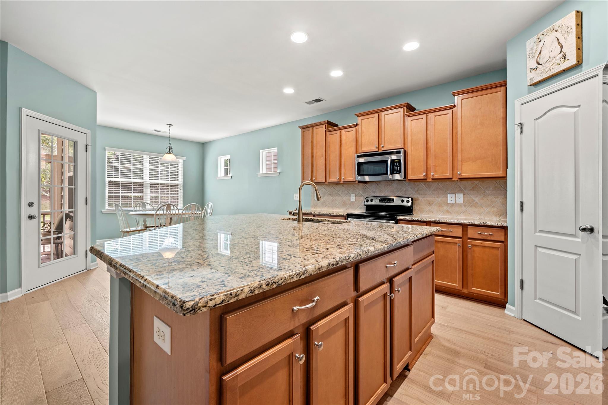 Kitchen offers plenty of work and storage space plus large pantry - 1601 Deer Meadows Drive, Waxhaw