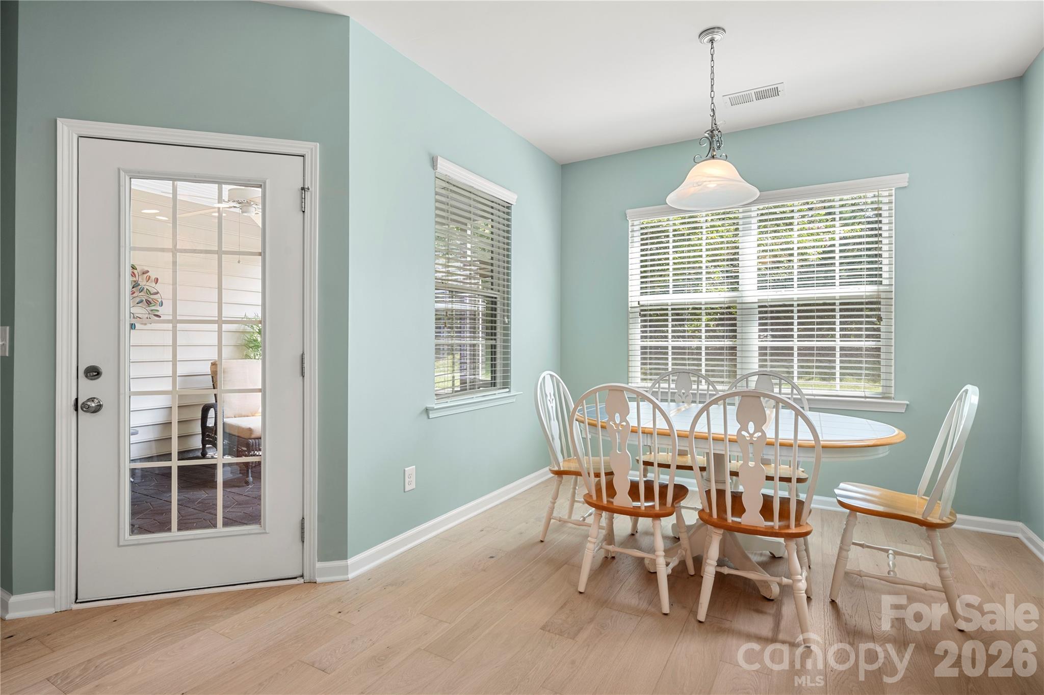Bright dining airy opens to screened porch - 1601 Deer Meadows Drive, Waxhaw