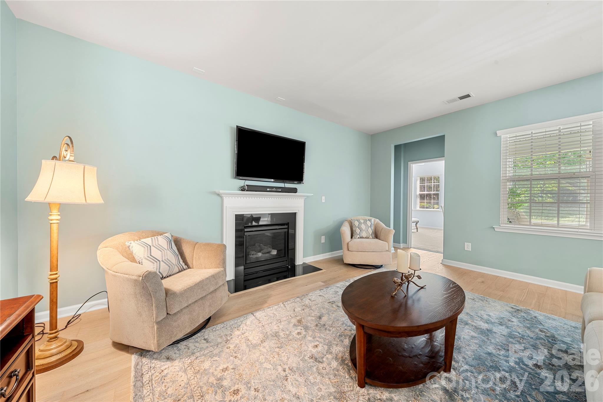 Living area with fireplace - 1601 Deer Meadows Drive, Waxhaw
