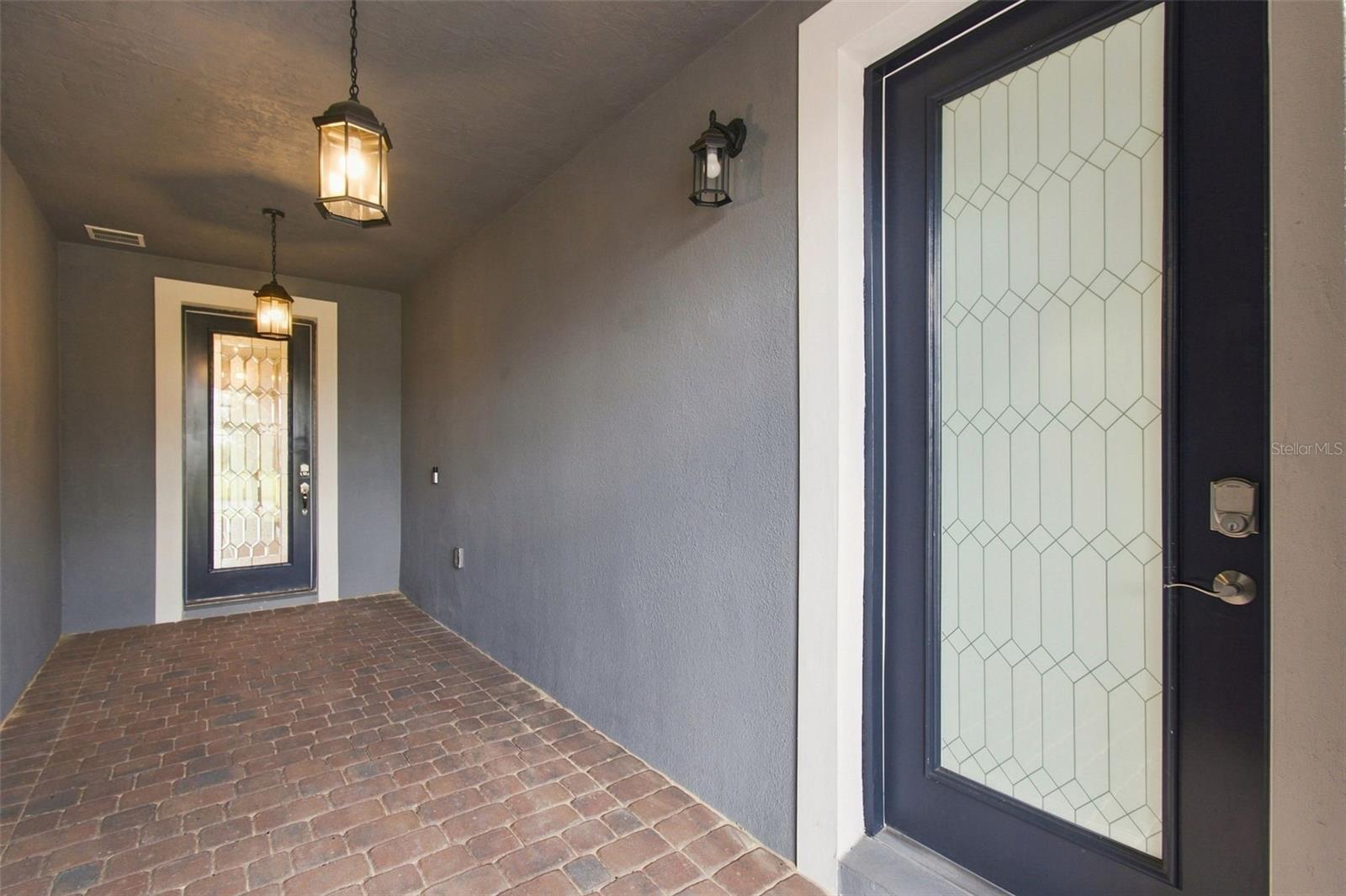 Entry way with in-law suite entrance - 163 OLYMPUS WAY, KISSIMMEE