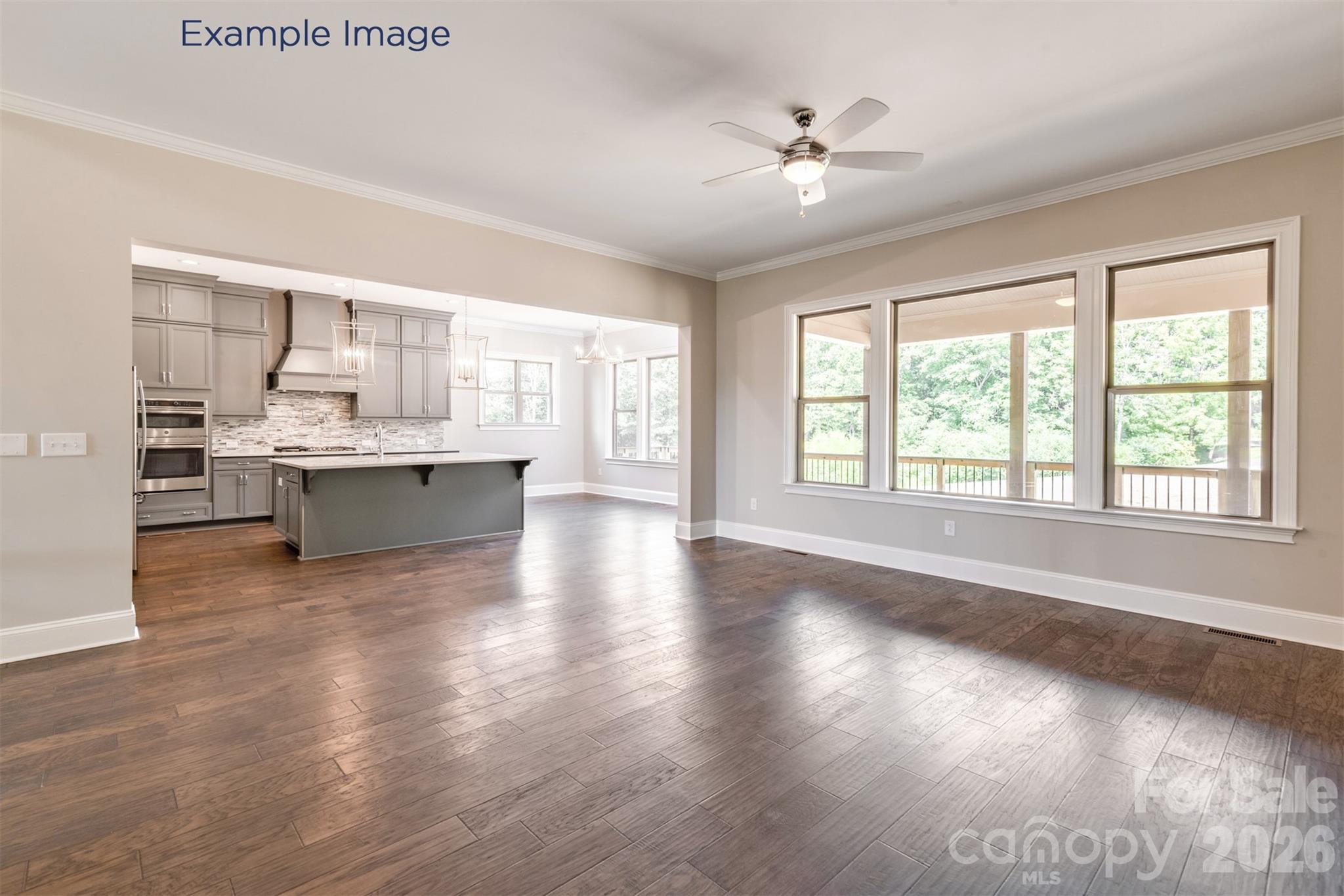 Example Photo - Family Room/Kitchen/Breakfast - 10919 Tyler Brook Lane, Mint Hill