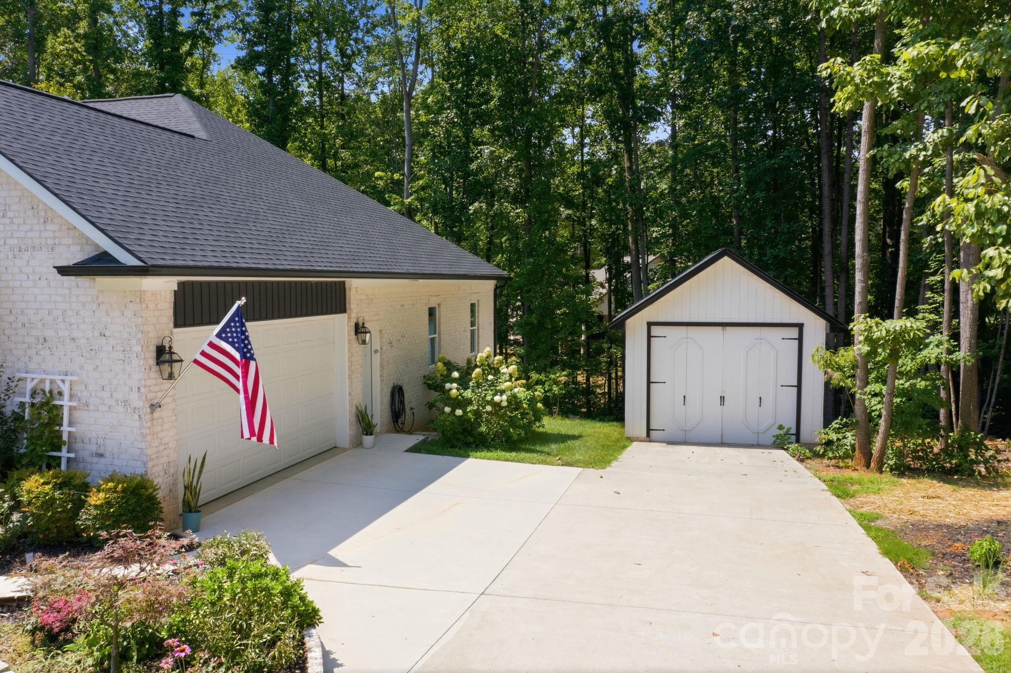 Attached 2 car garage and detached garage/boathouse. - 116 Harbor Ridge Drive, Statesville