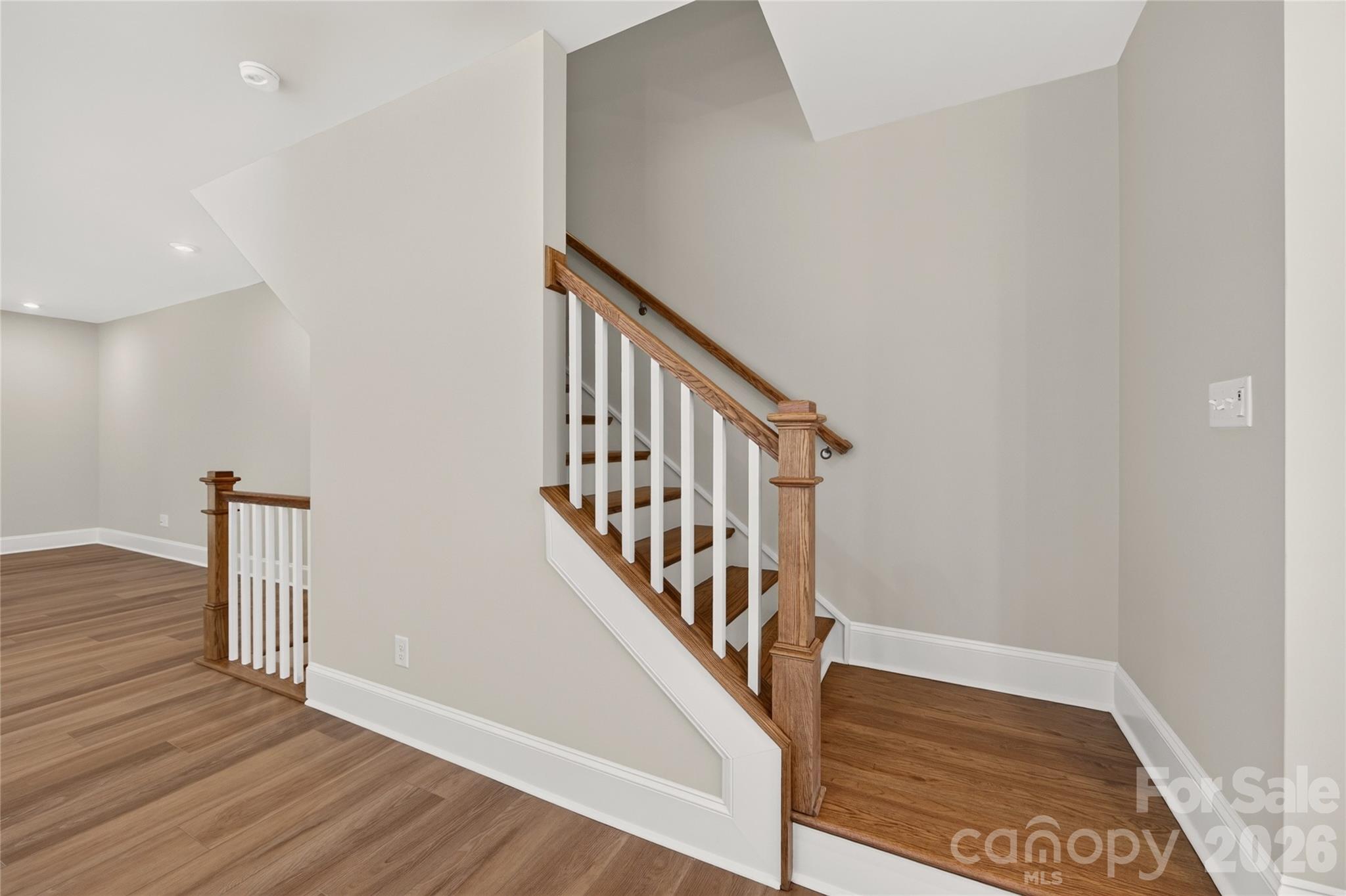 Oak box stairs add warmth - 403 Old Town Village Road, Waxhaw