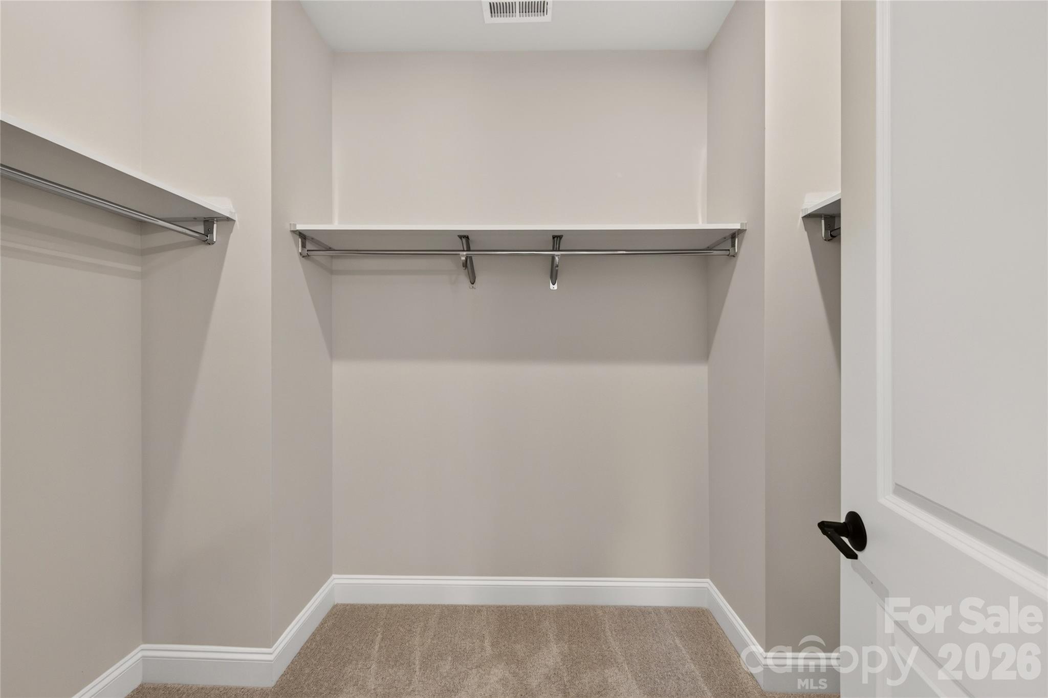 Upgraded shelves in primary closet - 403 Old Town Village Road, Waxhaw