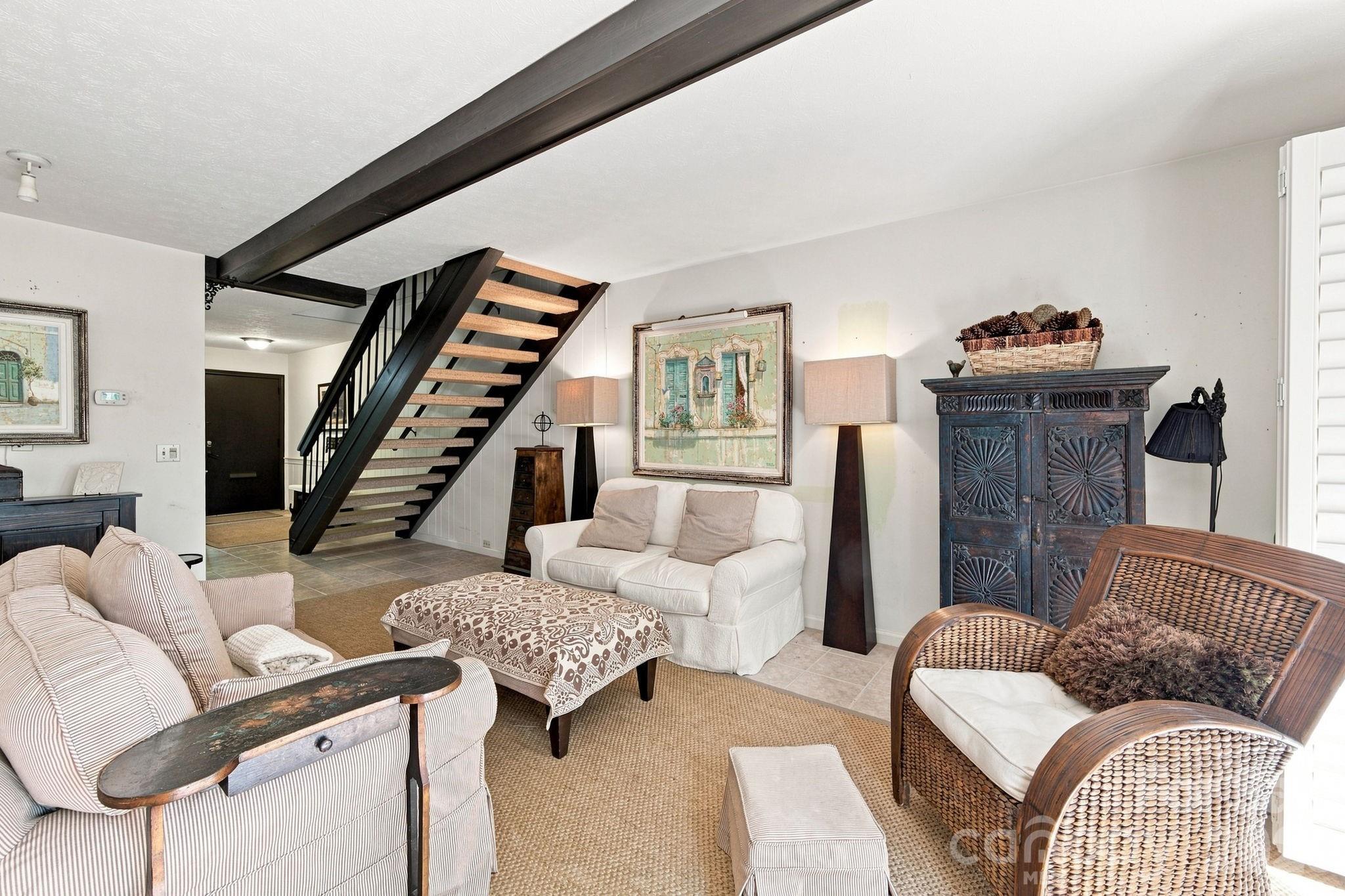 View of Living Room looking towards stairs - 98 Laurelwood Circle W, Hendersonville
