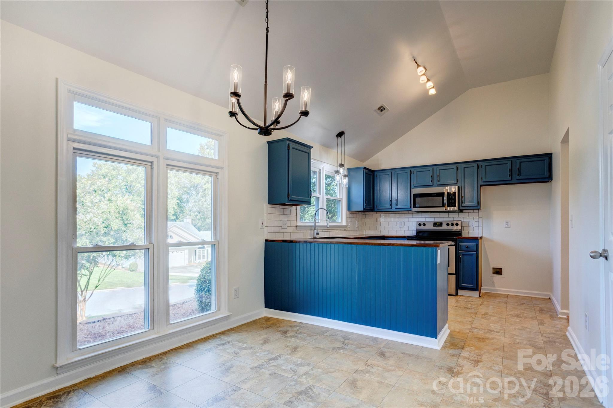 Beautiful kitchen with updated lighting - 156 Edgewater Drive NW, Concord
