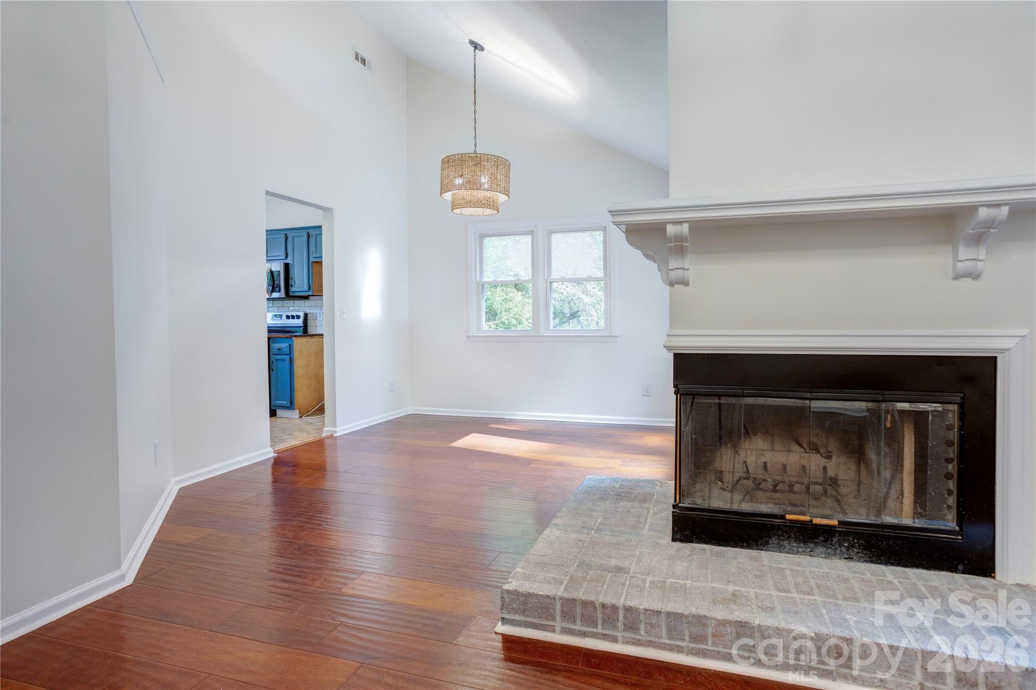 Family room with corner fireplace - 156 Edgewater Drive NW, Concord