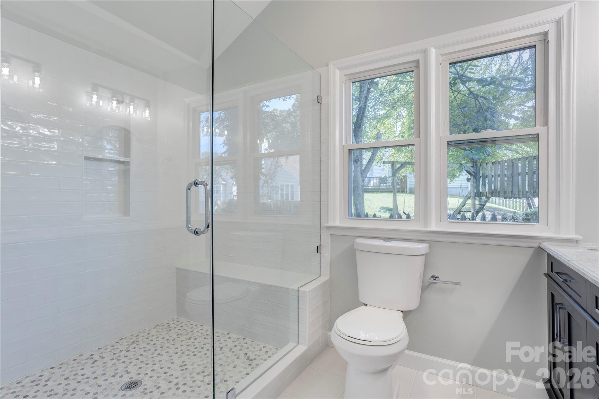 Beautifully updated primary bath with huge step in shower - 156 Edgewater Drive NW, Concord