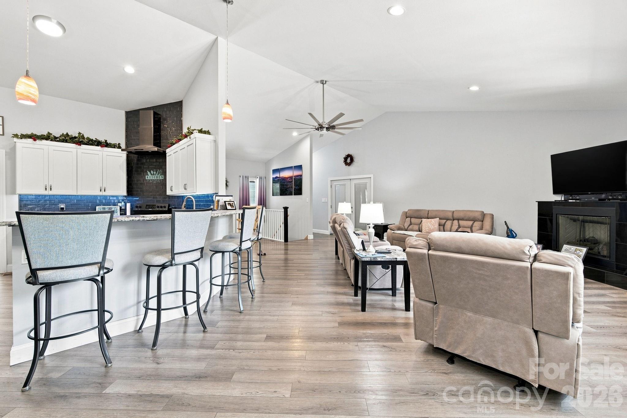 Stunning, sun-drenched open floor plan with high ceilings, large windows, and premium finishes throughout, perfect for both relaxing and entertaining. - 295 Idlewood Drive, Marion