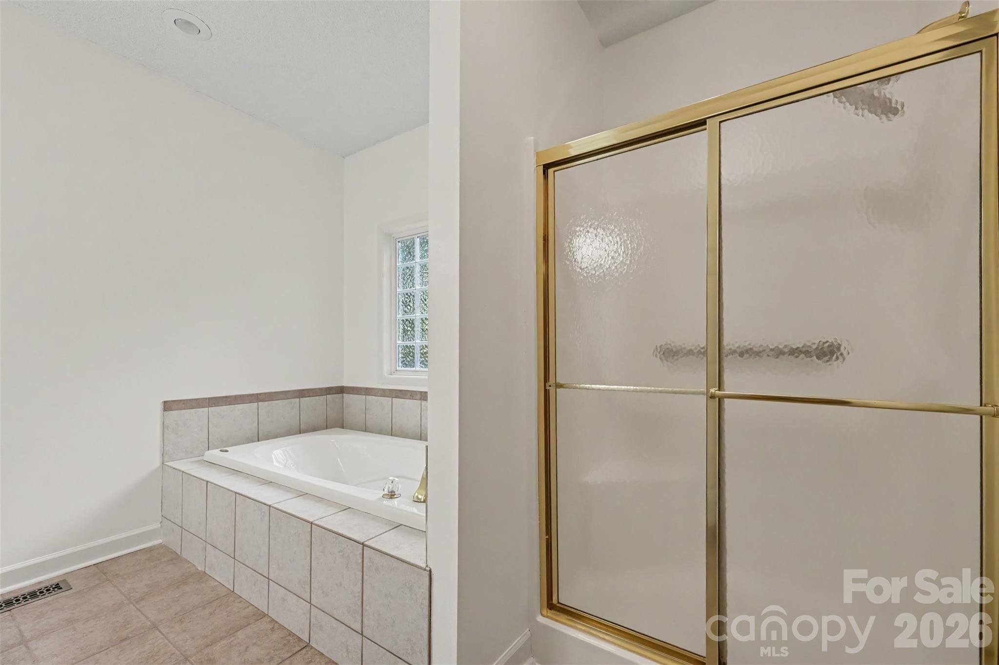 Primary Bathroom with Tub and Separate Shower - 1928 Twin Ponds Drive, Hickory
