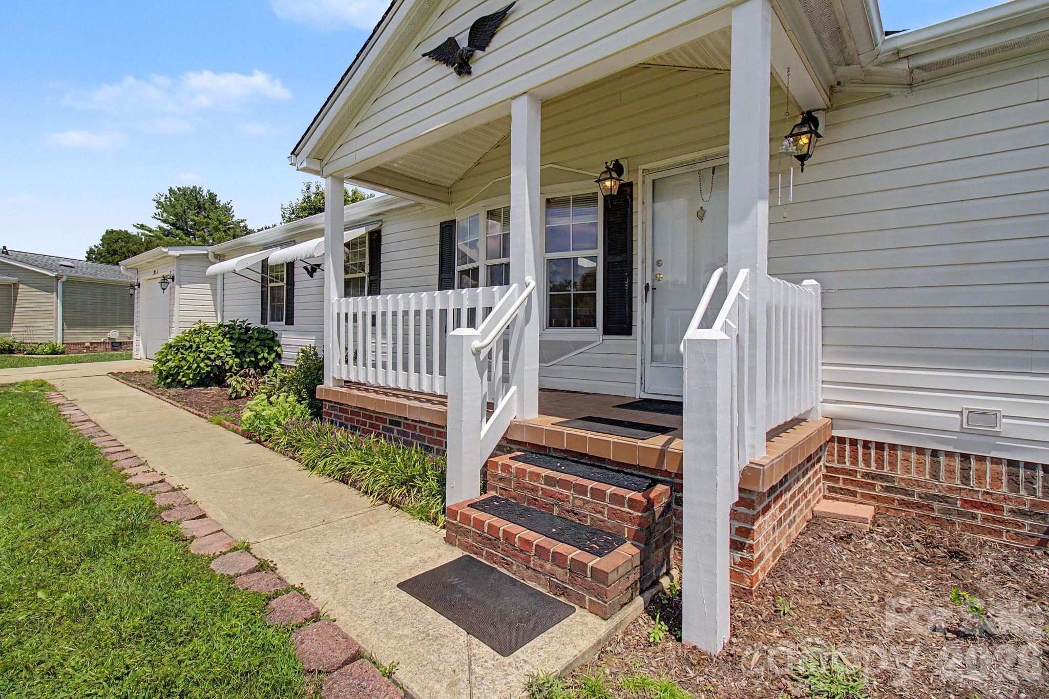Multiple outdoor living areas. - 204 Red Birch Court, Hendersonville