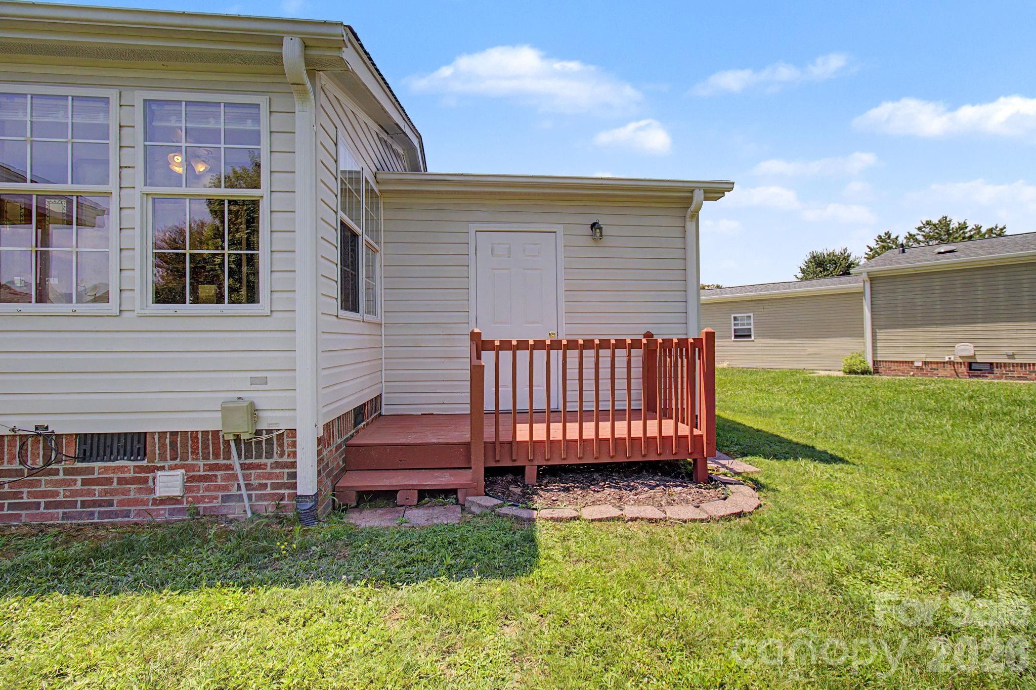 Backyard gagrae entrance - 204 Red Birch Court, Hendersonville