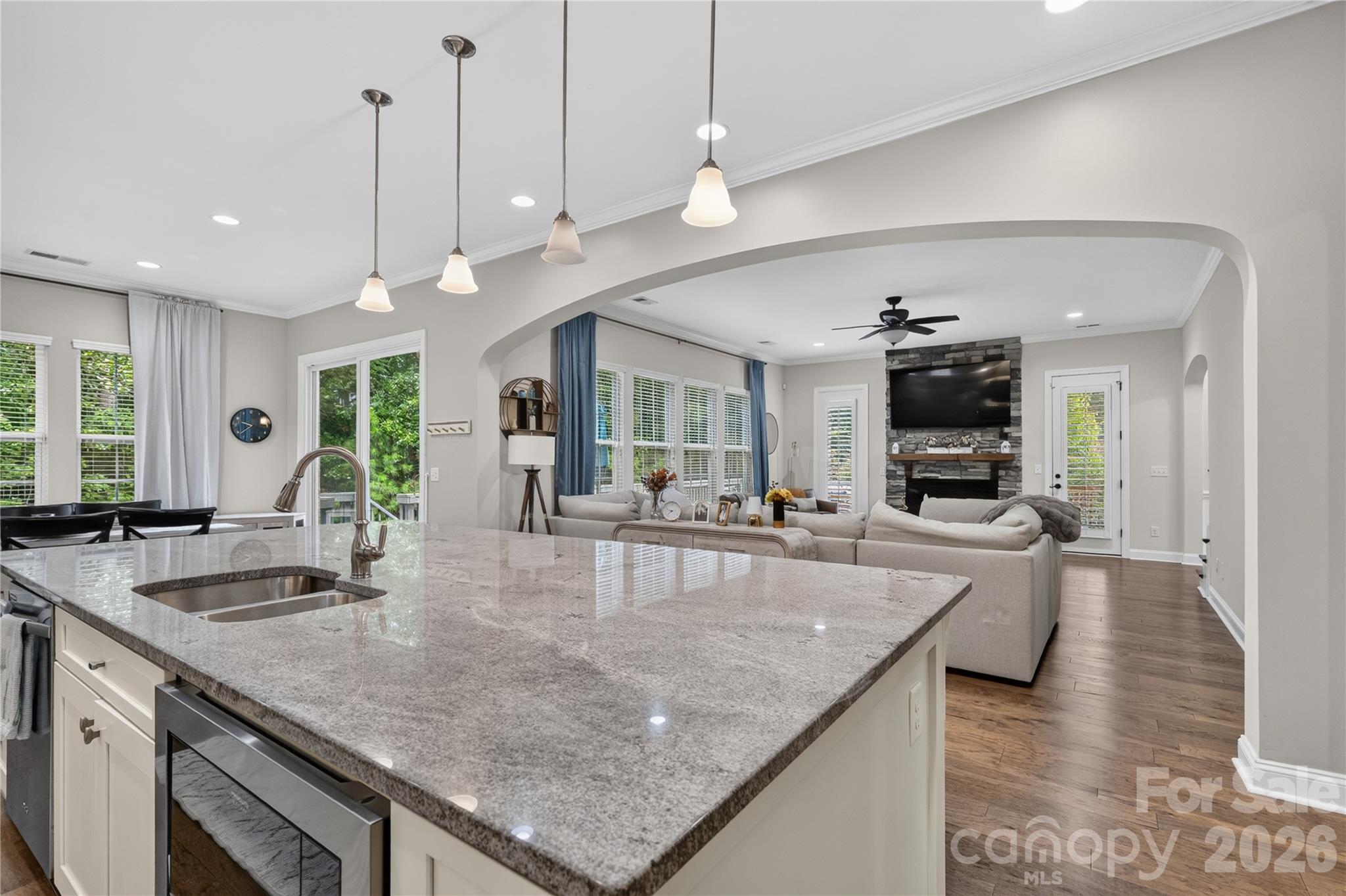 Kitchen, cafe area and living area - 1402 Smoketree Court, Waxhaw