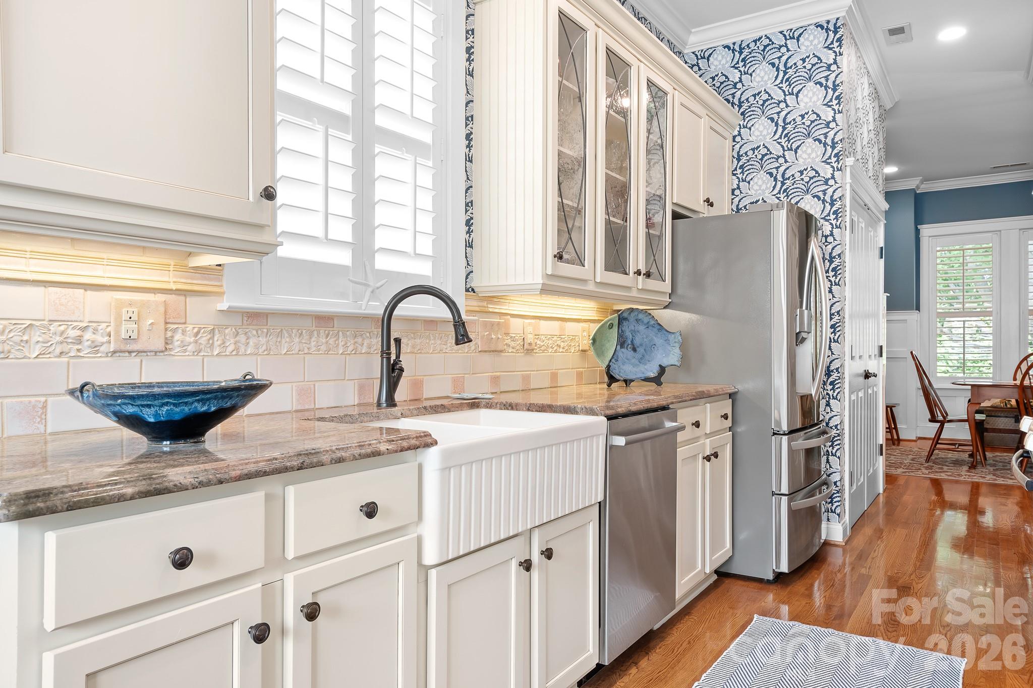 So many little details have been added. Notice the high end countertops, backsplash, farmhouse style sink and plantation shutters. - 17525 Calverton Road, Huntersville