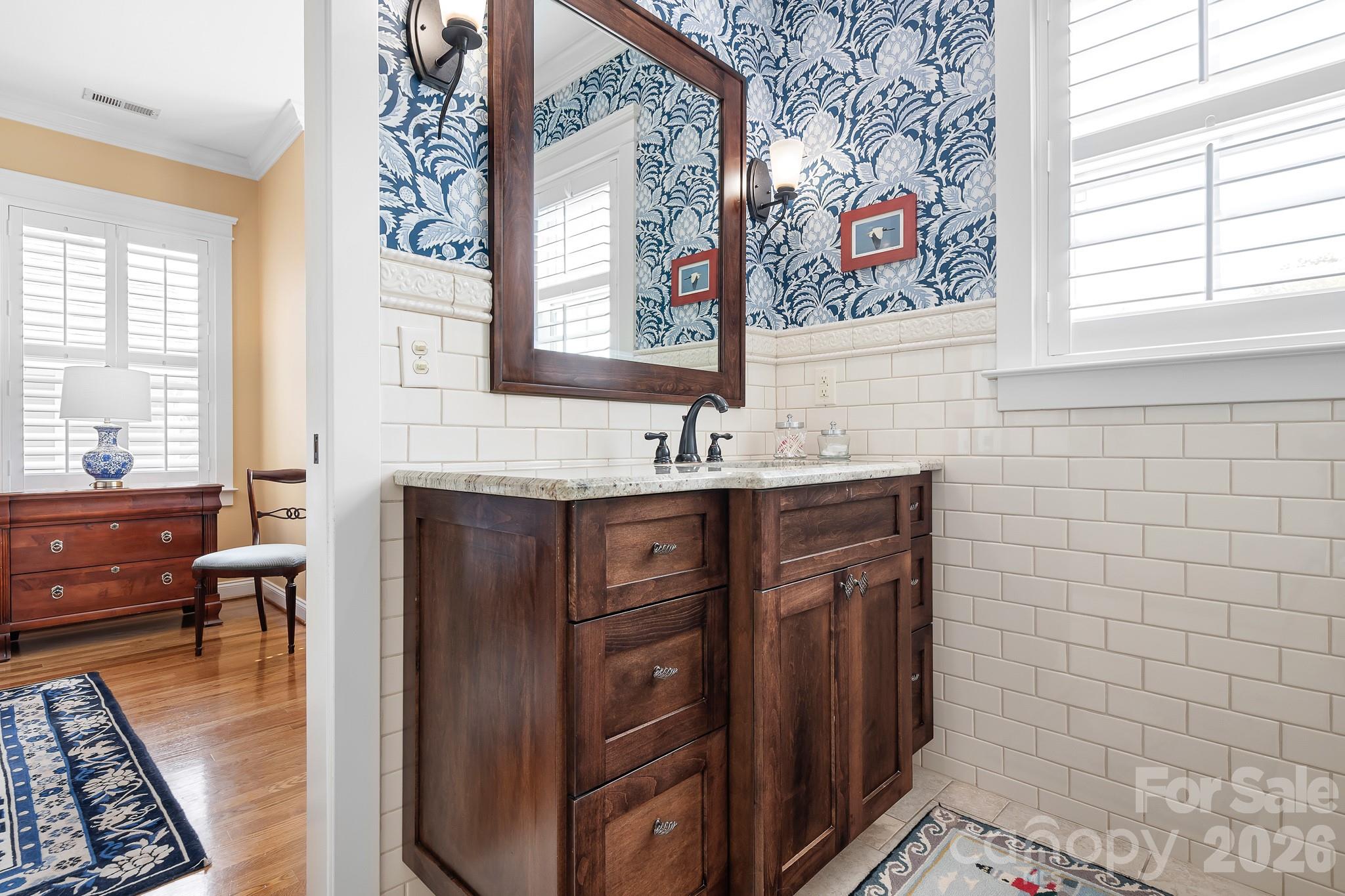 Updated Primary bath with beautiful tile and cabinetry. - 17525 Calverton Road, Huntersville