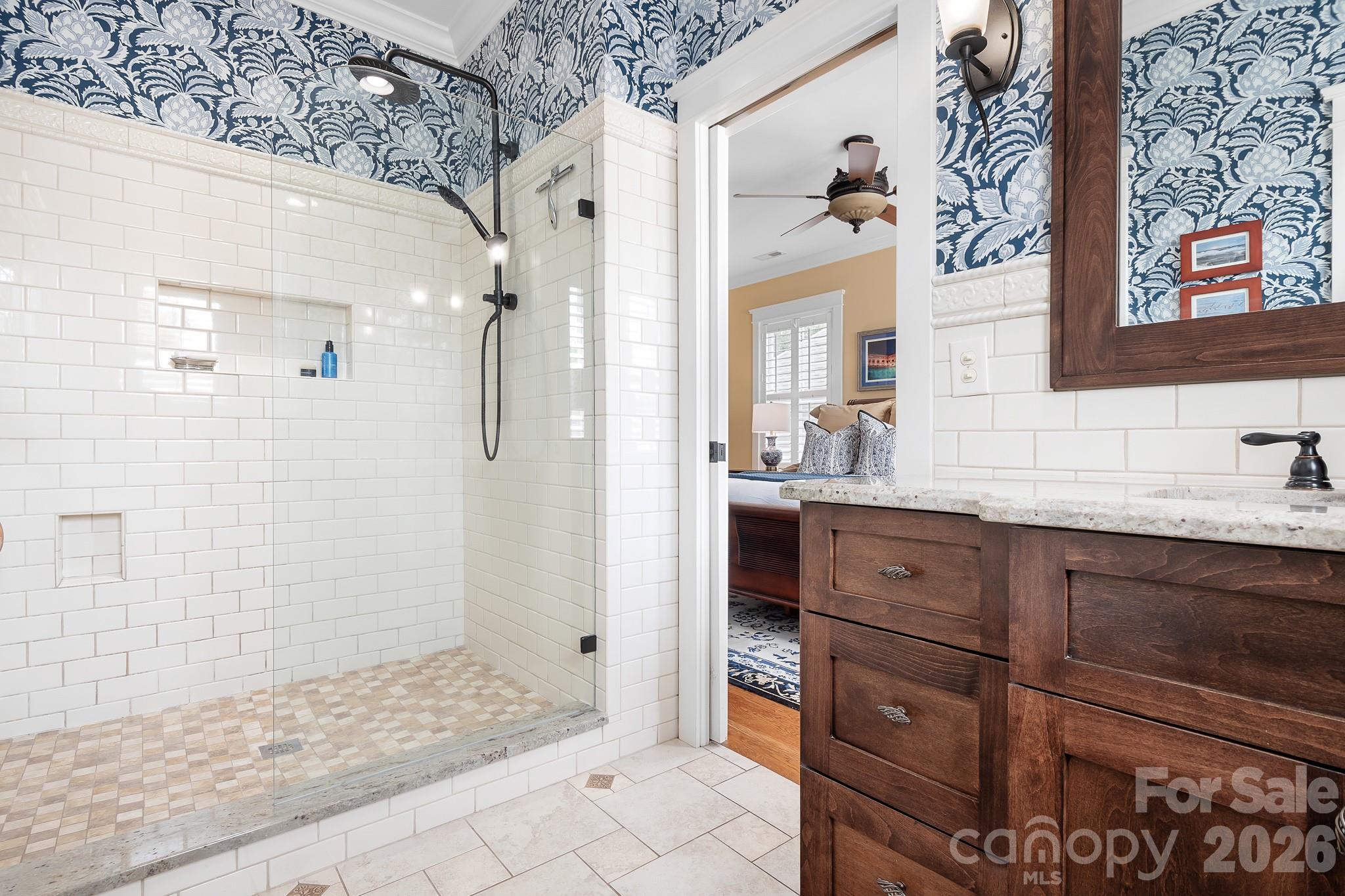 Custom walk in shower in primary bath. - 17525 Calverton Road, Huntersville