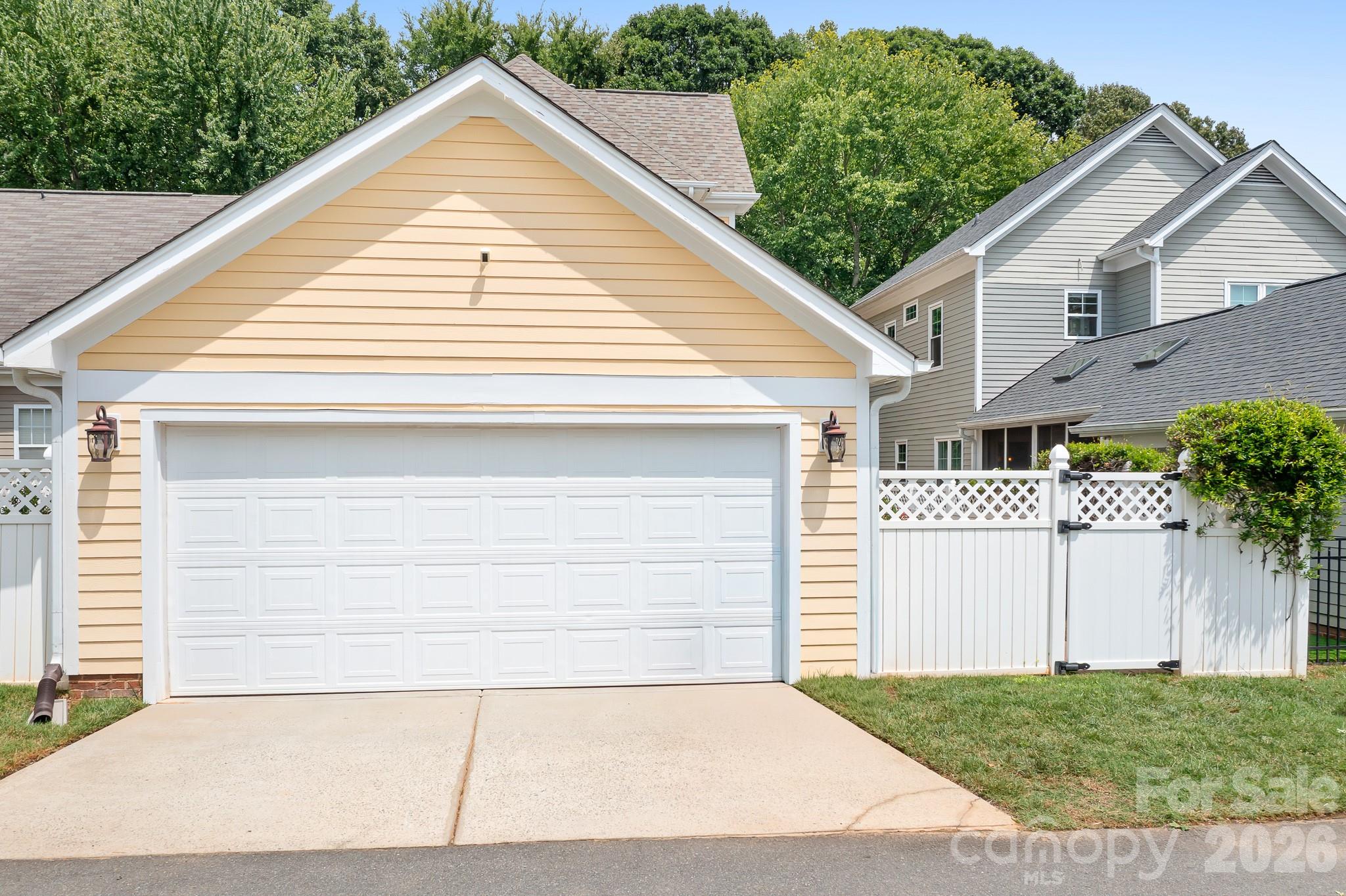 2 car garage with storage in attic. Also see the additional storage room at rear of home. - 17525 Calverton Road, Huntersville