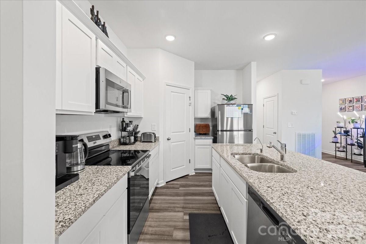 Single Family Residence at 144 BABBLING BROOK Drive, Clayton, photo 25 of 48